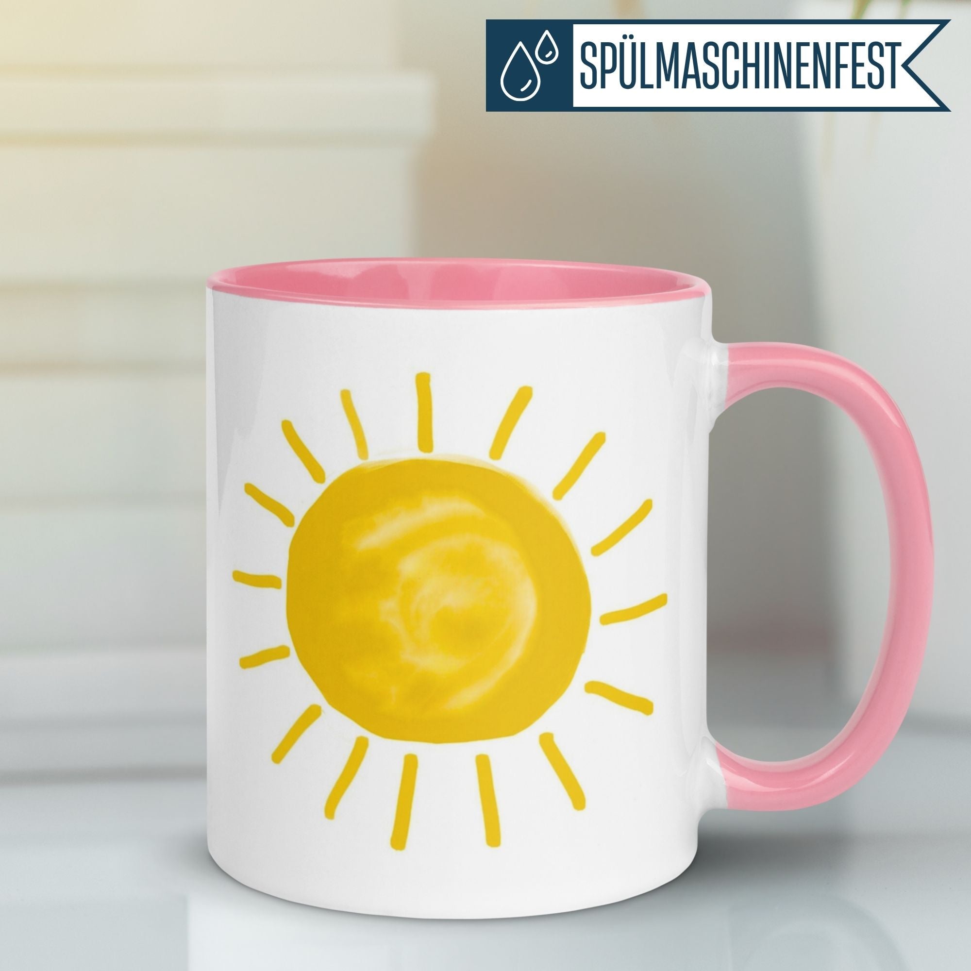 Momentals® Tasse mit gelber Sonnenillustration und rosa Griff für einen strahlenden Start in den Tag.
