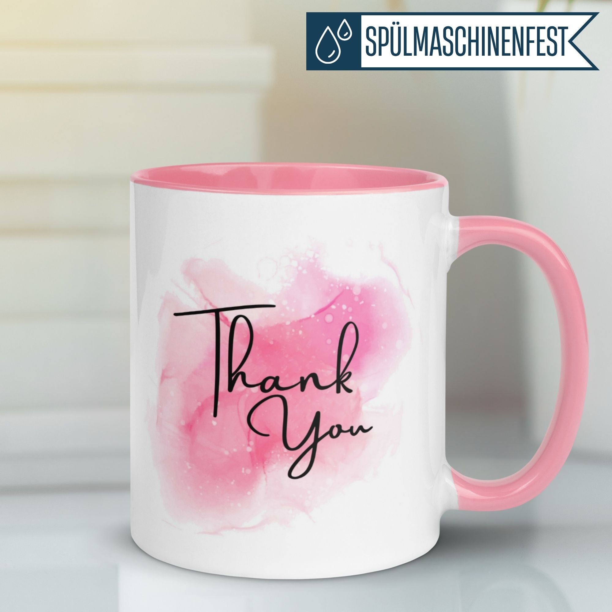 Momentals Tasse Dankeschön mit Aquarell-Motiv in Rosa und Schriftzug 'Thank You'.
