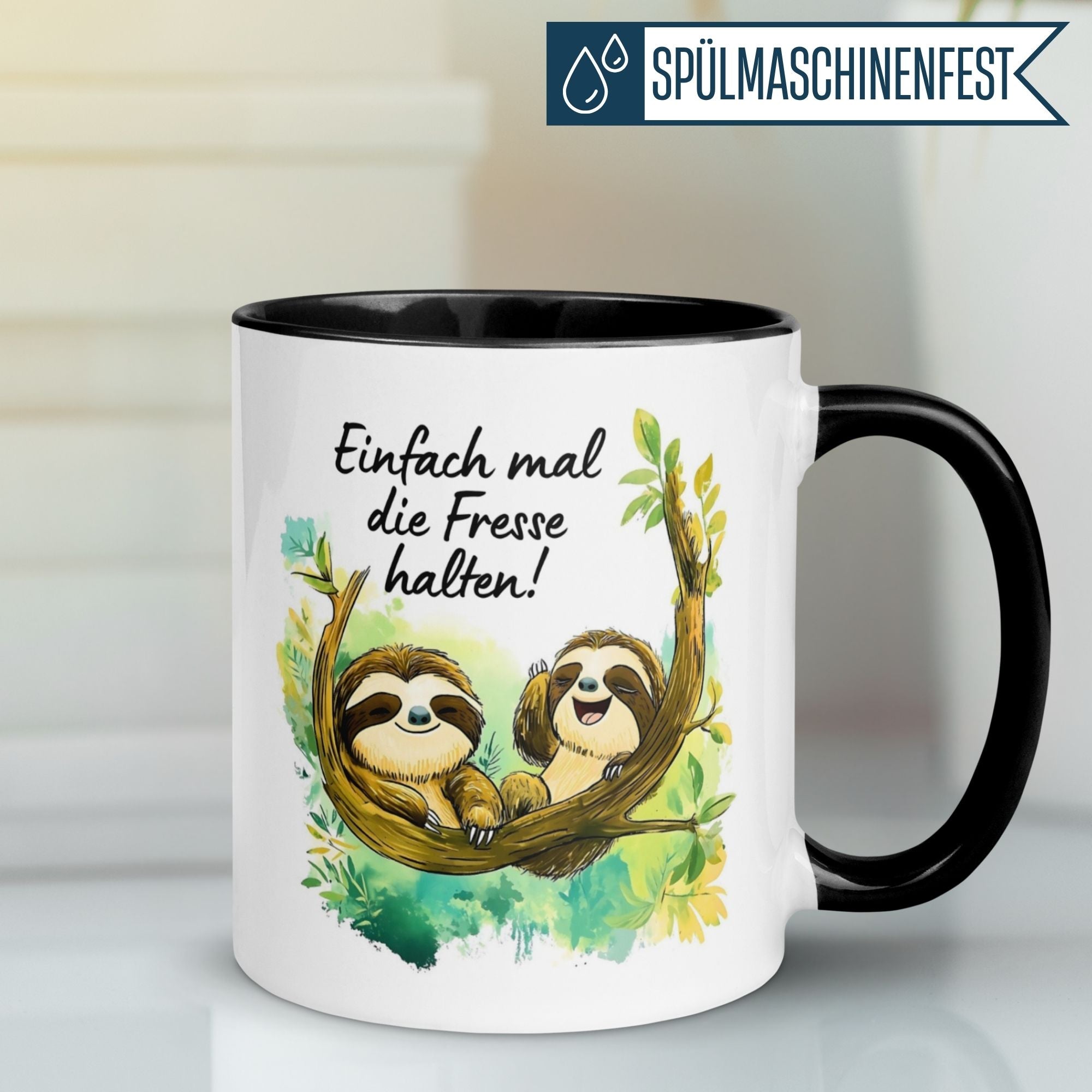 Momentals Tasse mit zwei Faultieren und dem Spruch "Einfach mal die Fresse halten!" auf einem Ast.