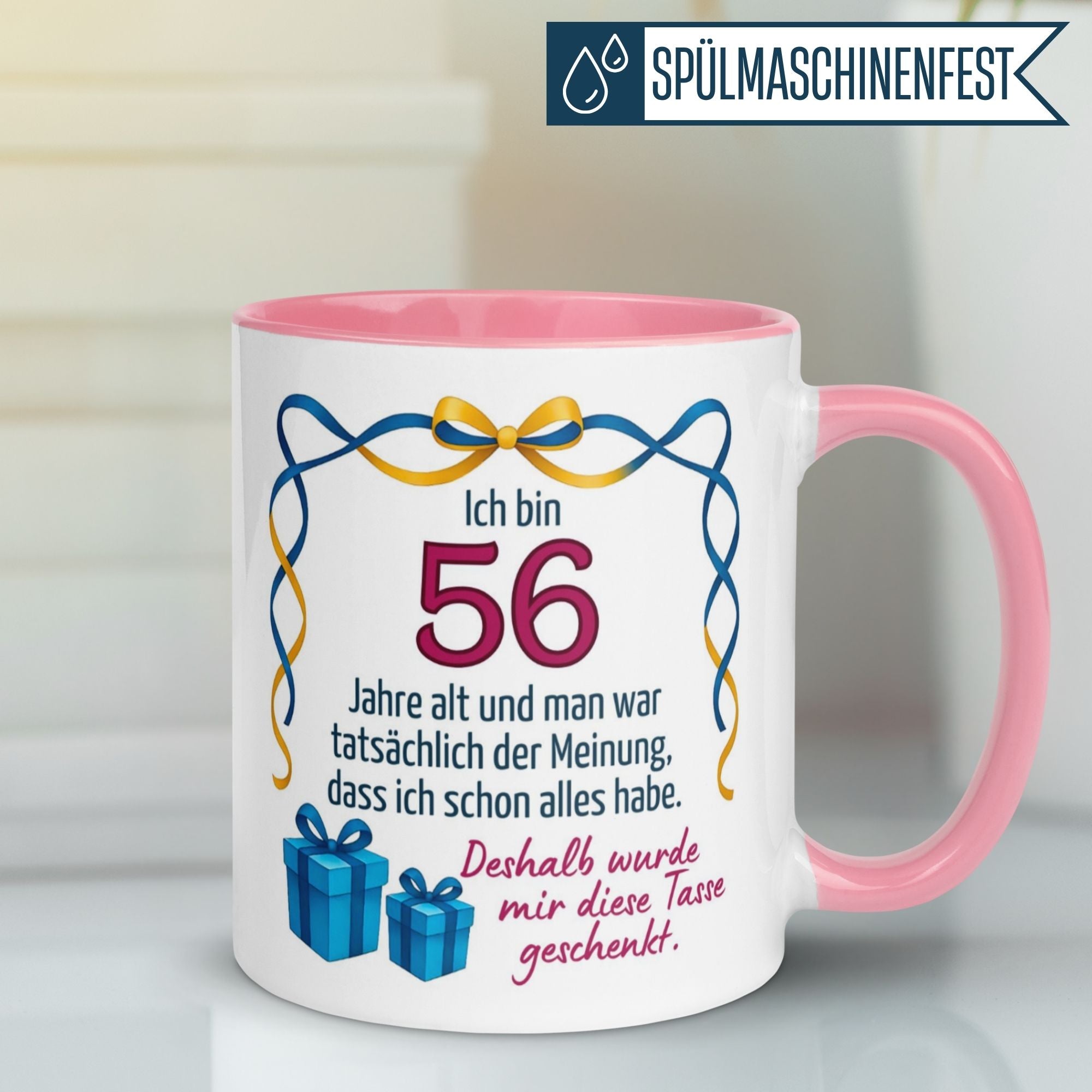 Momentals Tasse für den 56. Geburtstag mit humorvollem Spruch und Geschenkmotiv.