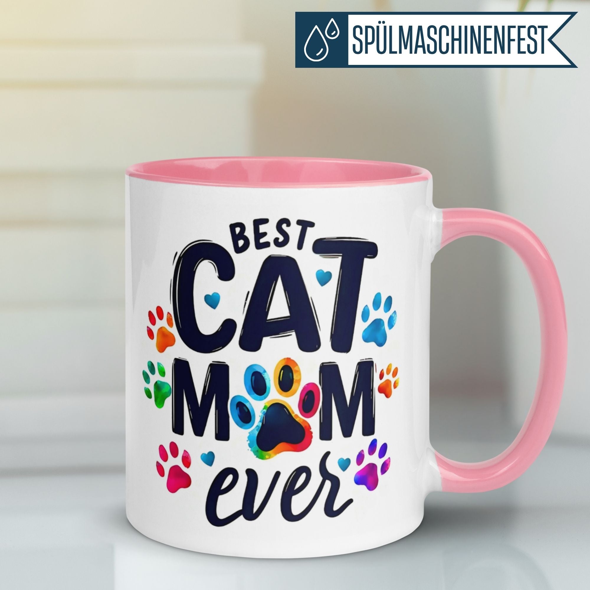 Colorful mug design saying 'Best Cat Mom Ever' with vibrant paw prints for cat lovers.