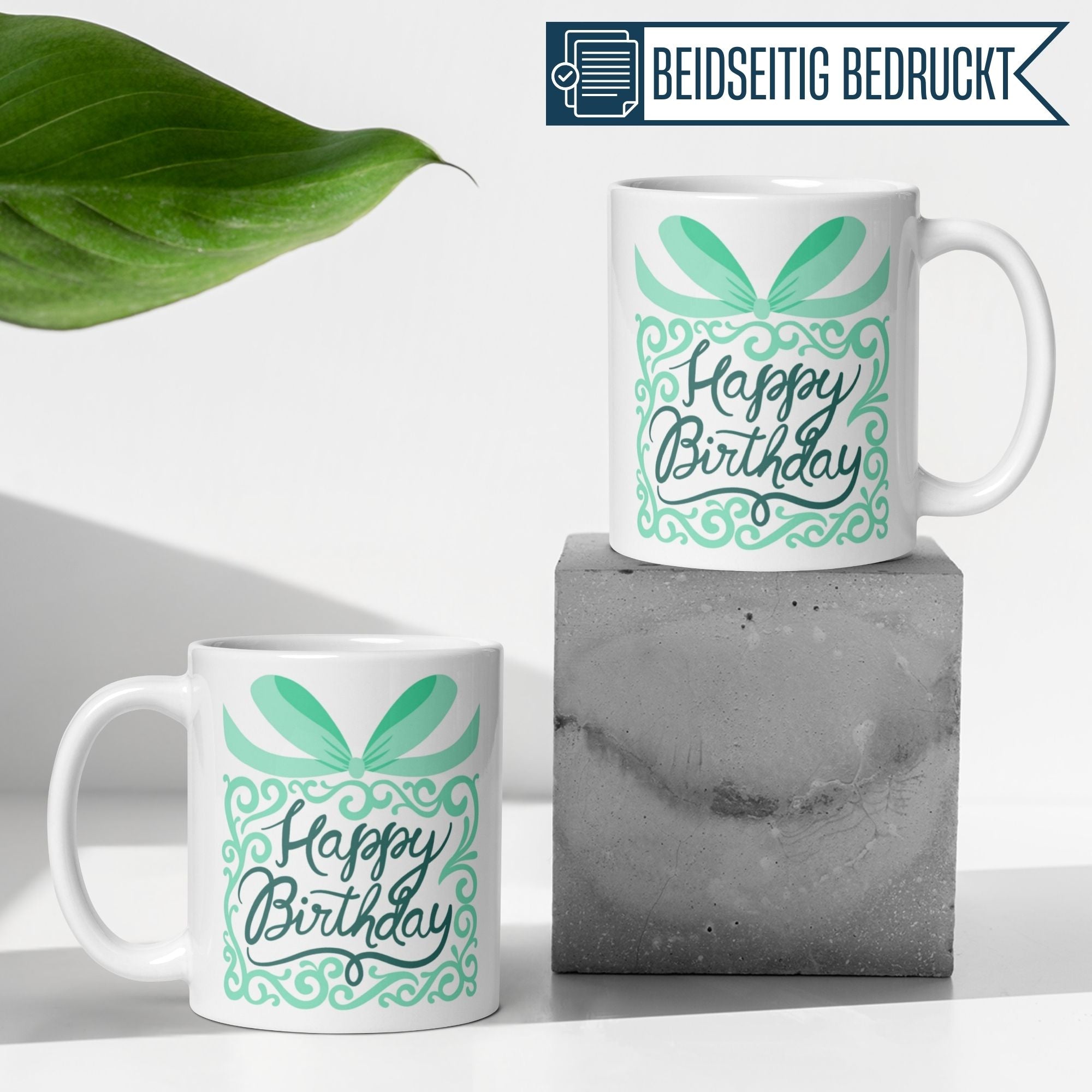 Stylish birthday mugs with elegant "Happy Birthday" design packaged in a gift box with green accents.