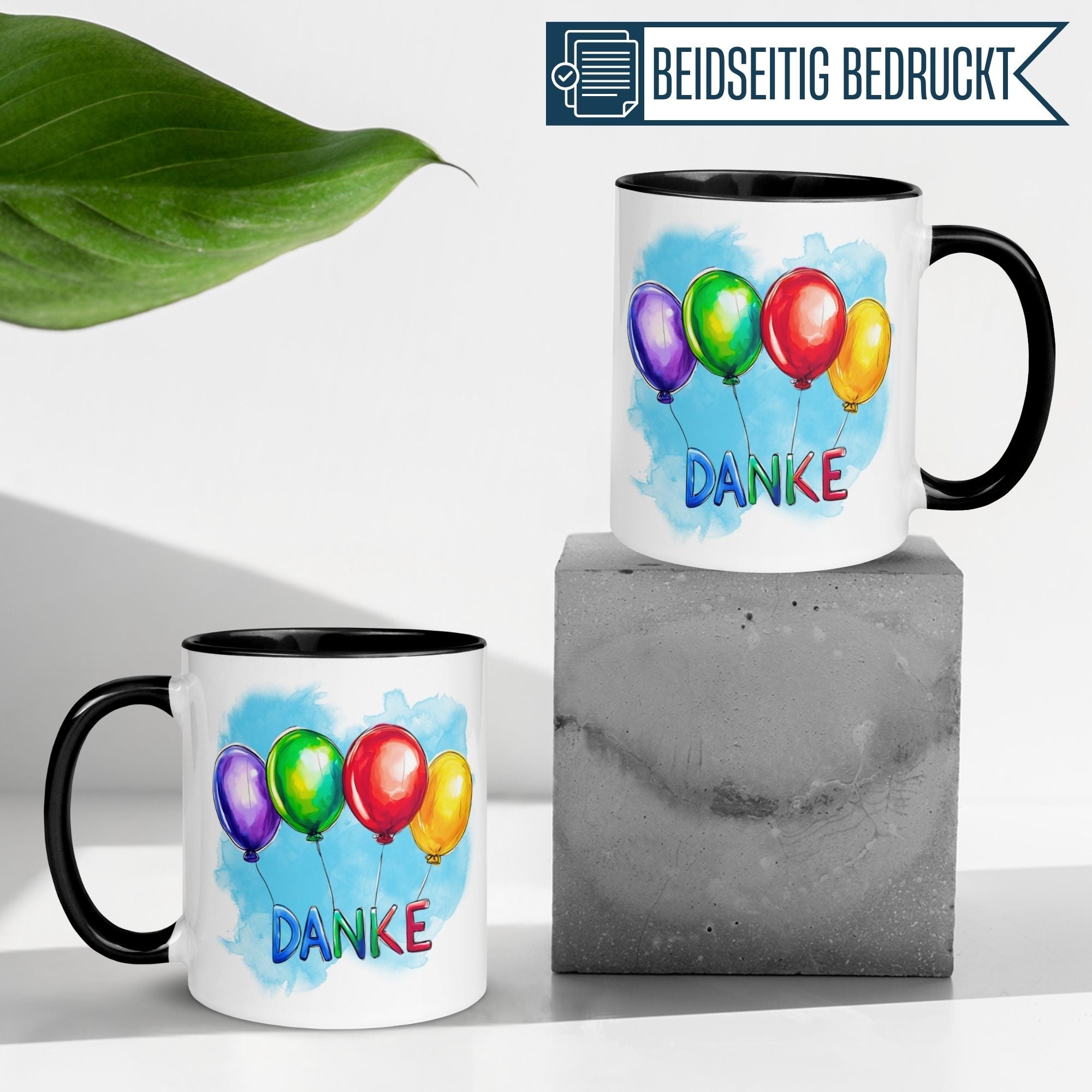 Momentals Tasse mit bunten Ballons und Danke-Schriftzug auf stylischem Hintergrund.