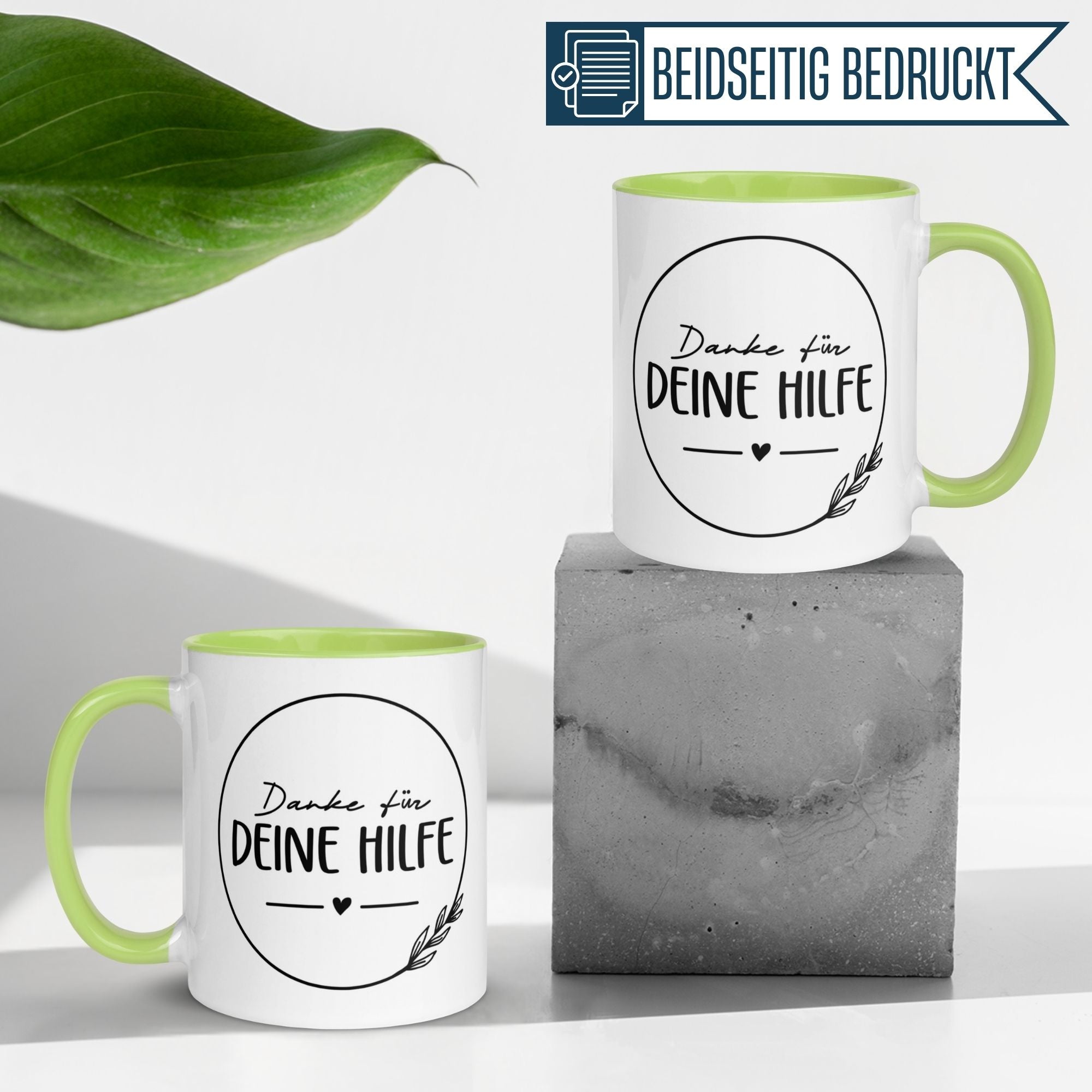 Momentals® Tasse Danke für deine Hilfe mit grünem Henkel und stilvollem Zweig-Motiv auf grauem Hintergrund.