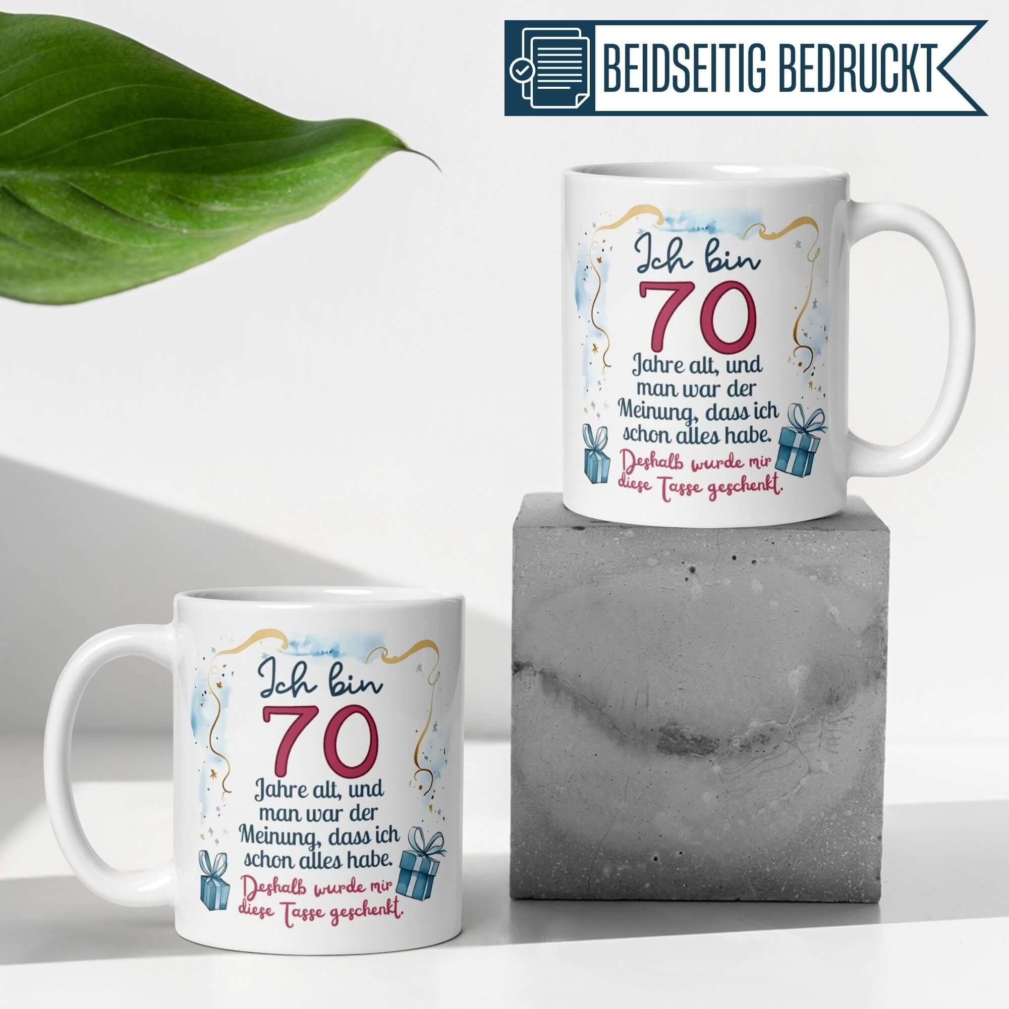 Humorous 70th birthday mug with saying 'Ich bin 70 Jahre alt' displayed on stylish concrete blocks.