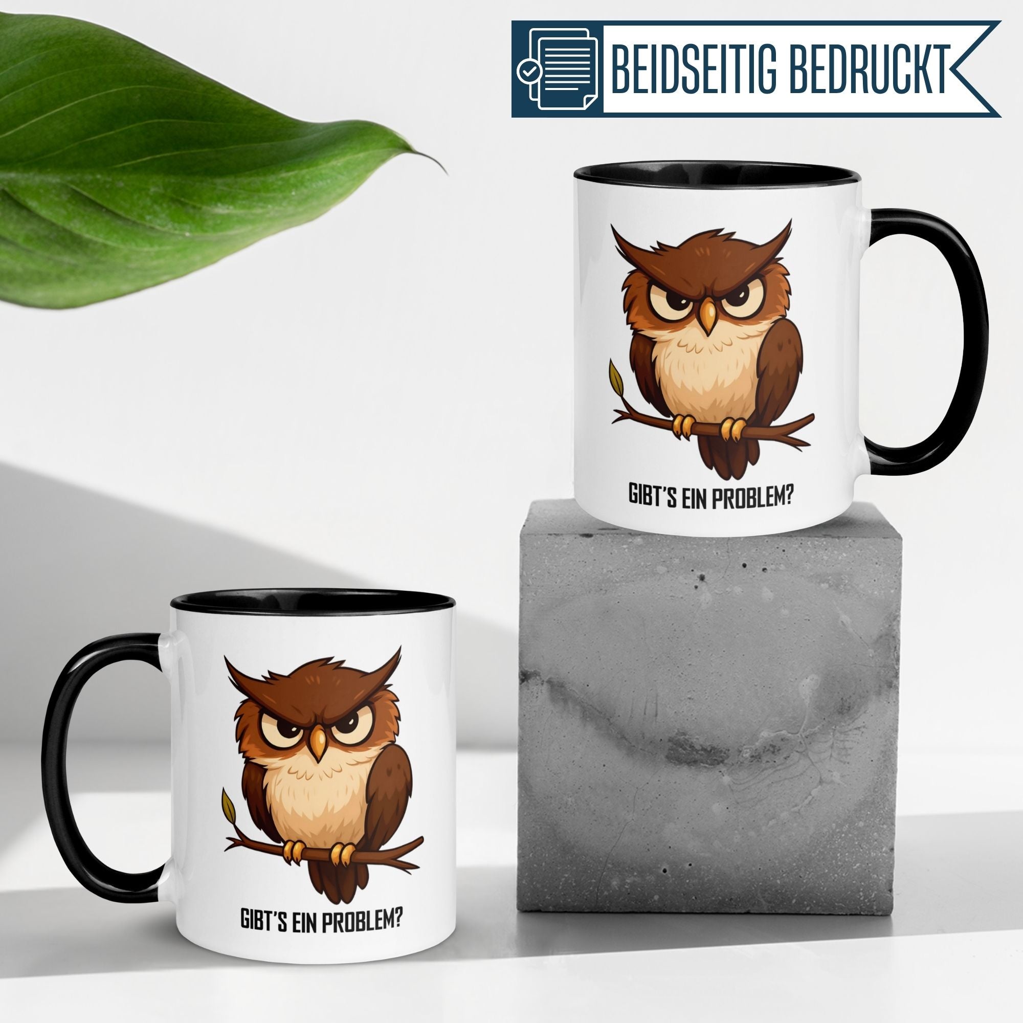 Momentals Tasse mit witziger Eule und Spruch 'Gibt's ein Problem?' auf grauem Untergrund.