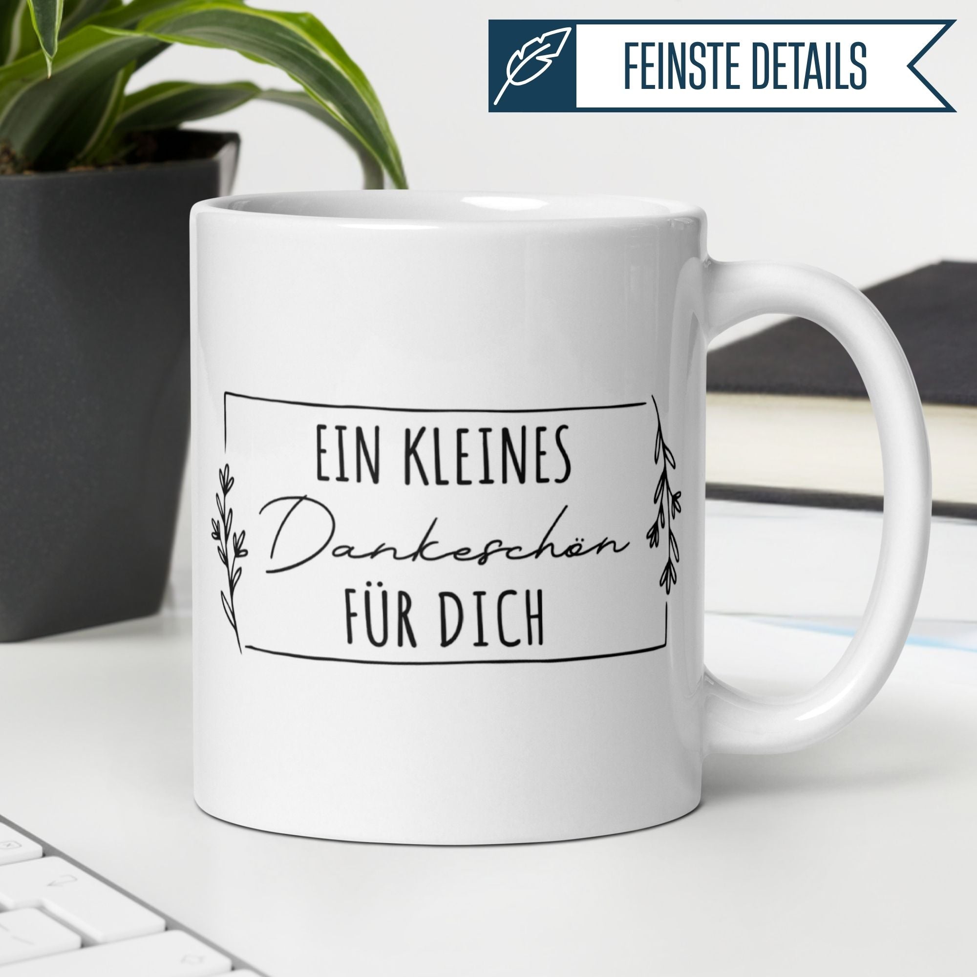 Momentals® Tasse Danke mit floralem Design, Text 'Ein kleines Dankeschön für dich', ideal als Geschenk.