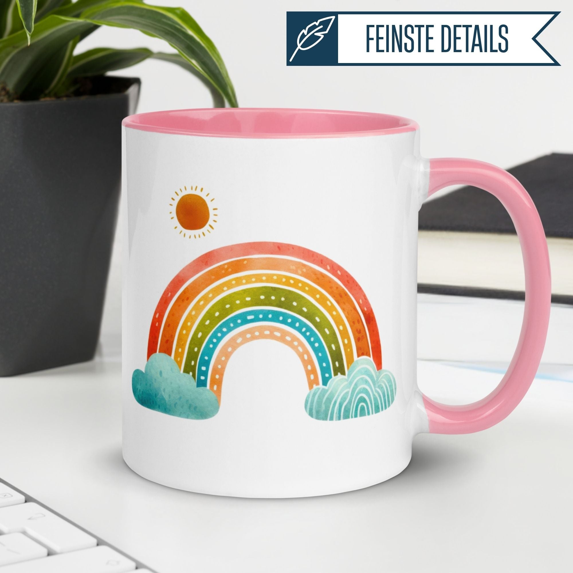 Momentals® Tasse mit buntem Regenbogen und Sonne auf weißem Hintergrund, perfekter Start in den Tag.