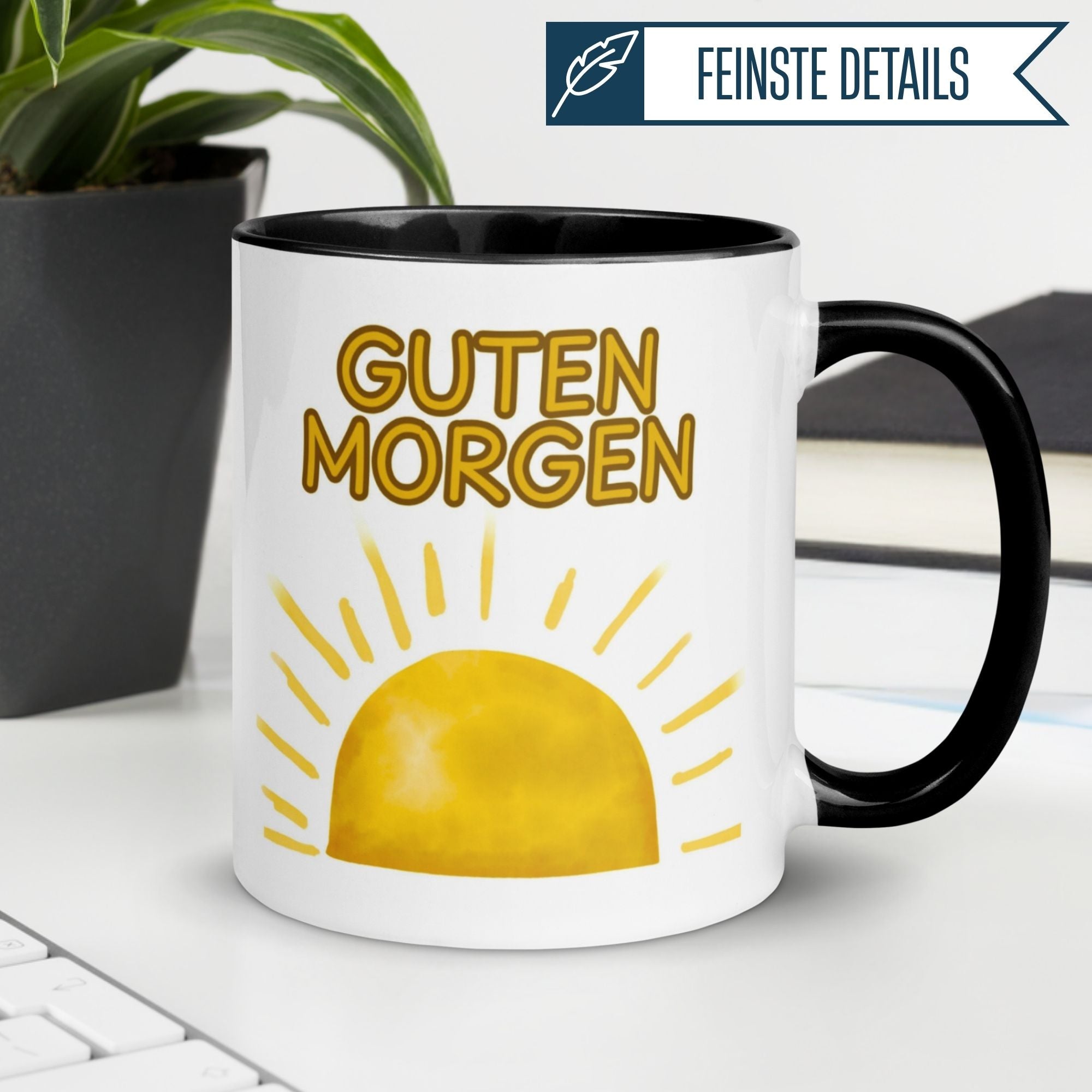 Momentals® Tasse mit Aufdruck "Guten Morgen" und stilisiertem Sonnenaufgang im Aquarell-Look.