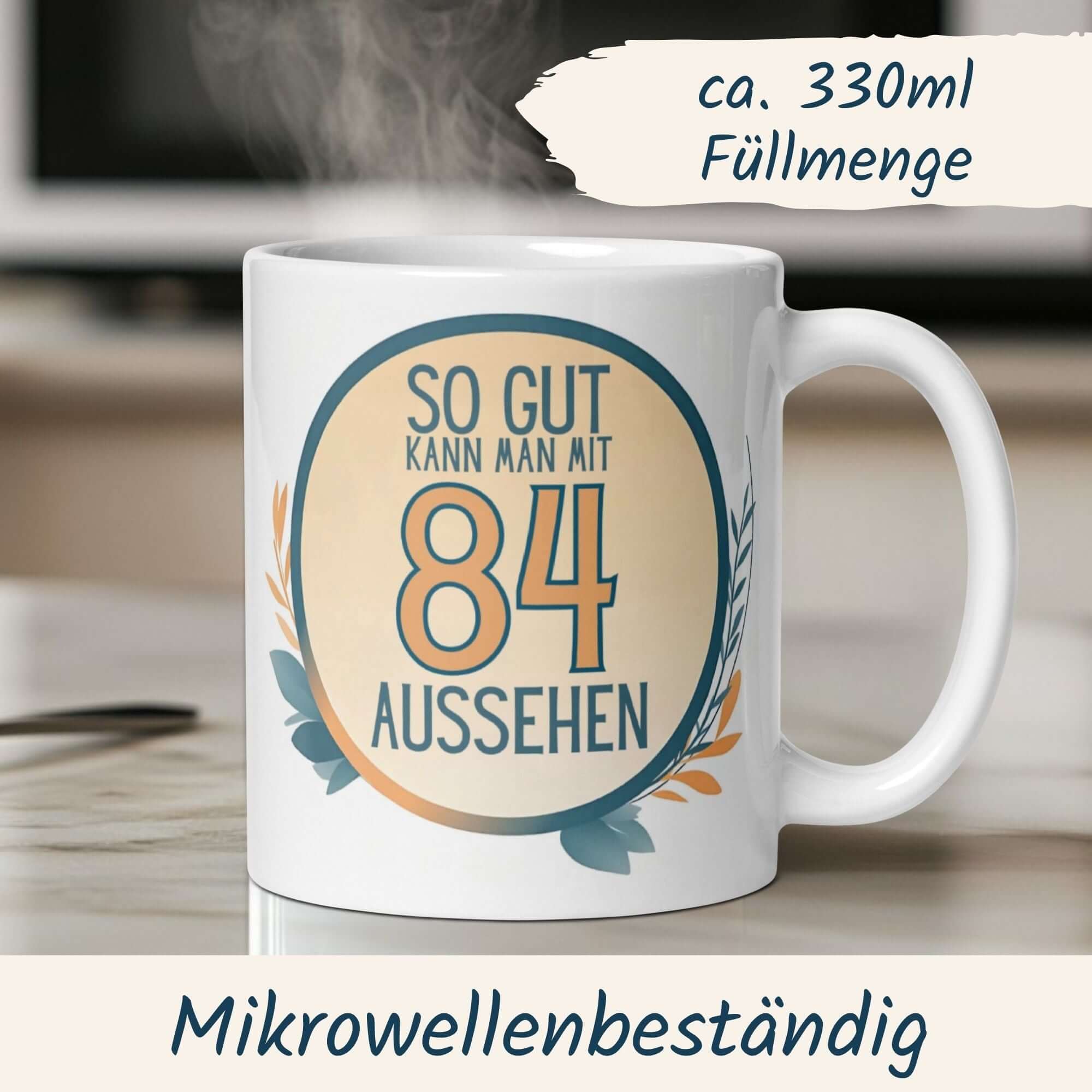 Momental Tasse zum 84. Geburtstag mit humorvollem Spruch für elegantes Feiern.