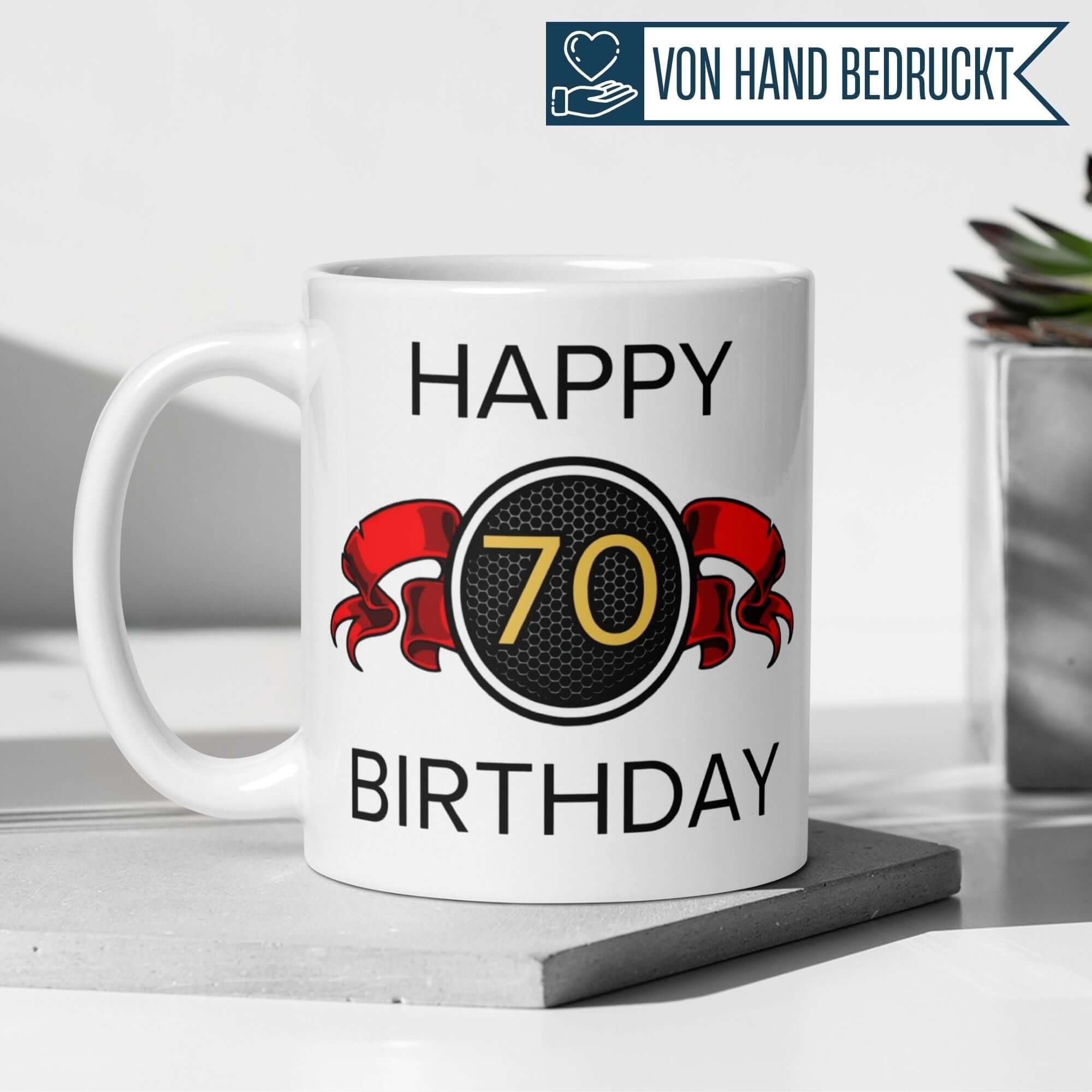 Momentals® Tasse für den 70. Geburtstag mit roter Schleife und Spruch "Happy Birthday".