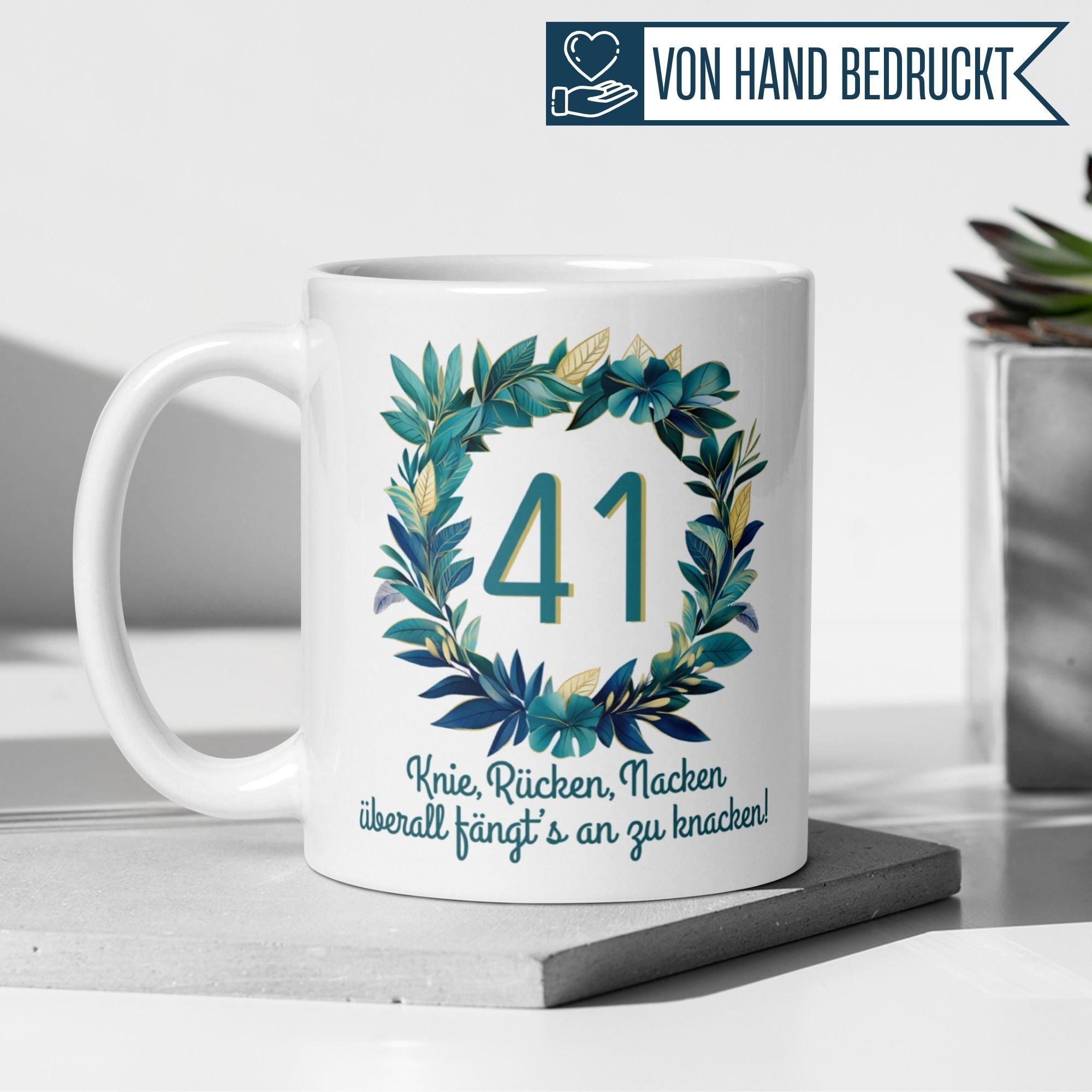 Humorous birthday mug for 41st birthday with leafy design and funny saying about aging.