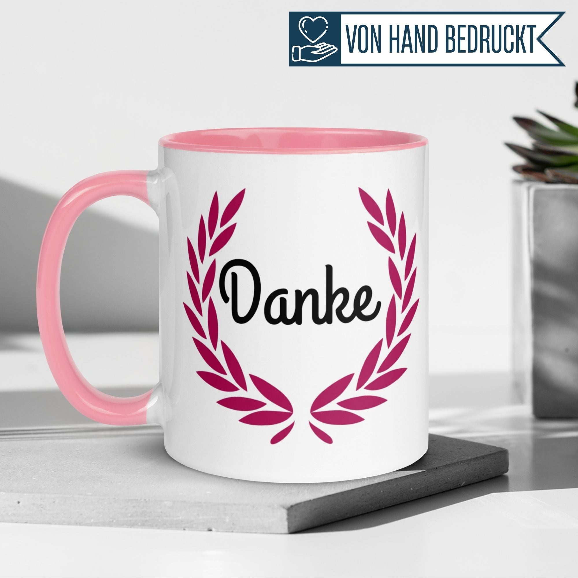 Momentals® Tasse Danke mit rosafarbenem Henkel und Blätterkranz-Motiv für herzliche Wertschätzung.