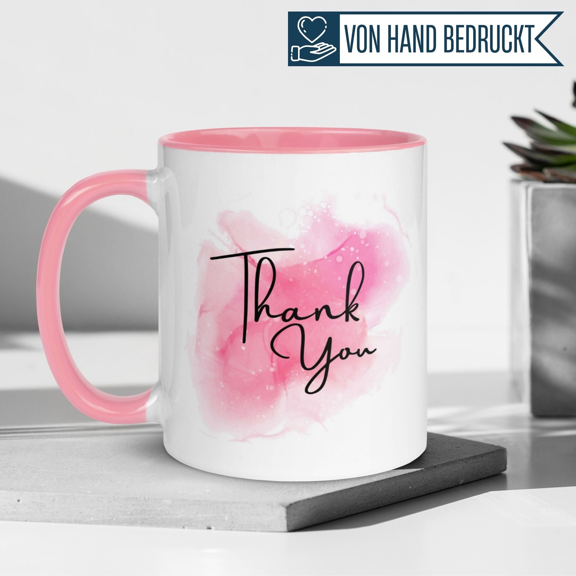 Momentals® Tasse Dankeschön in rosa, zeigt 'Thank You' in elegantem Aquarell-Design.