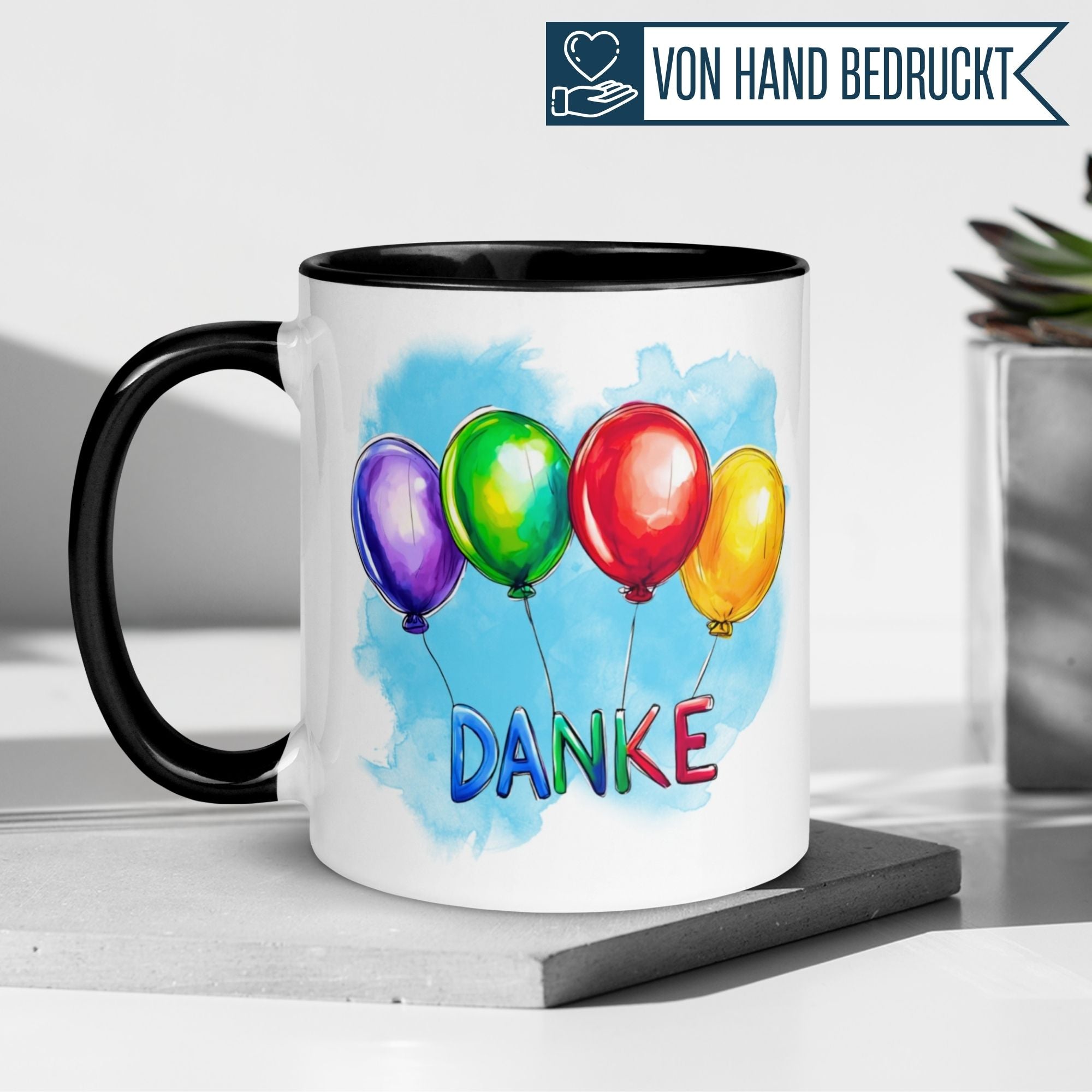 Momentals® Tasse mit bunten Ballons und 'DANKE' als herzliche Wertschätzung.