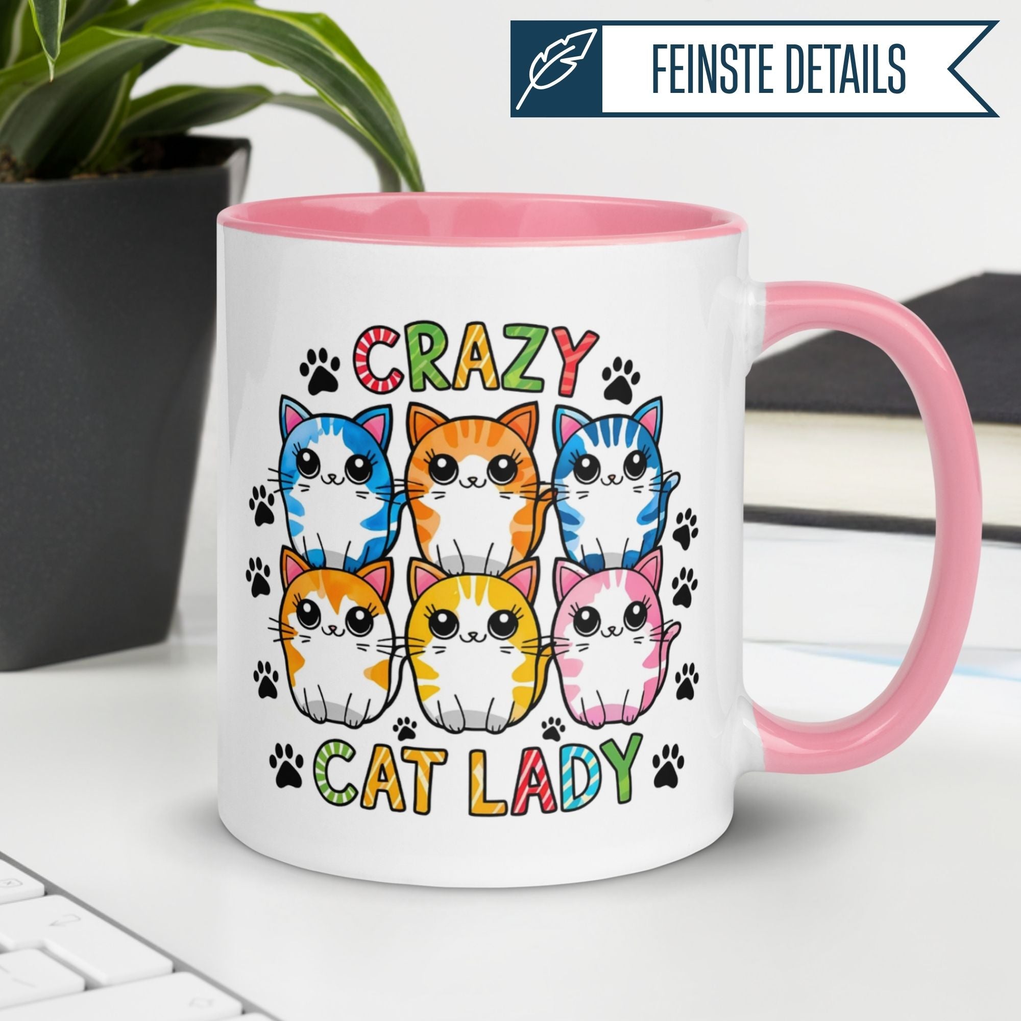 Humorous Momentals® mug design featuring colorful cartoon cats and the text 'Crazy Cat Lady' on a pink background.