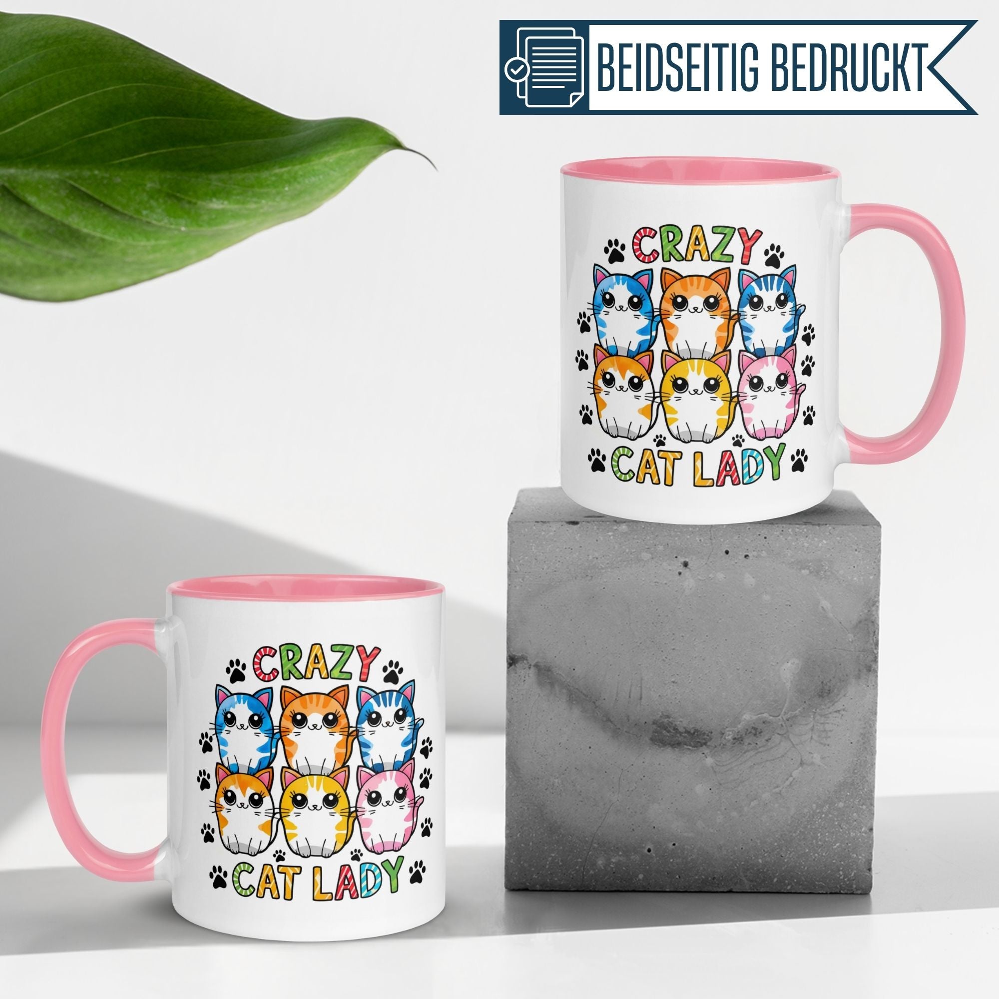Momentals Crazy Cat Lady mug with colorful cat designs and pink handle, perfect for cat lovers