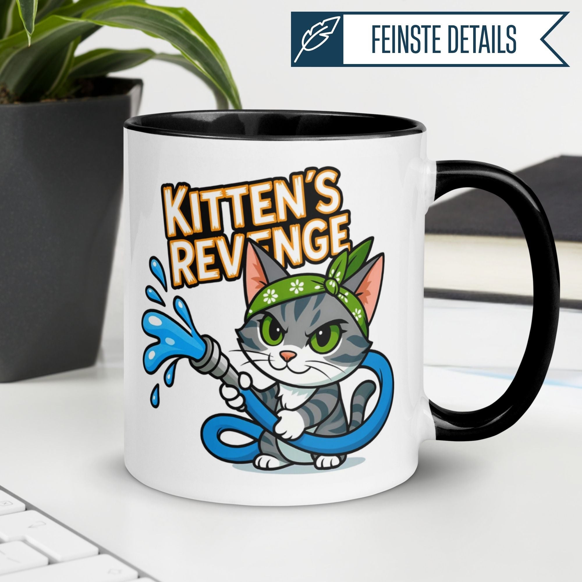 Humorous Momentals mug with a mischievous cat wielding a garden hose, captioned 'Kitten's Revenge'.