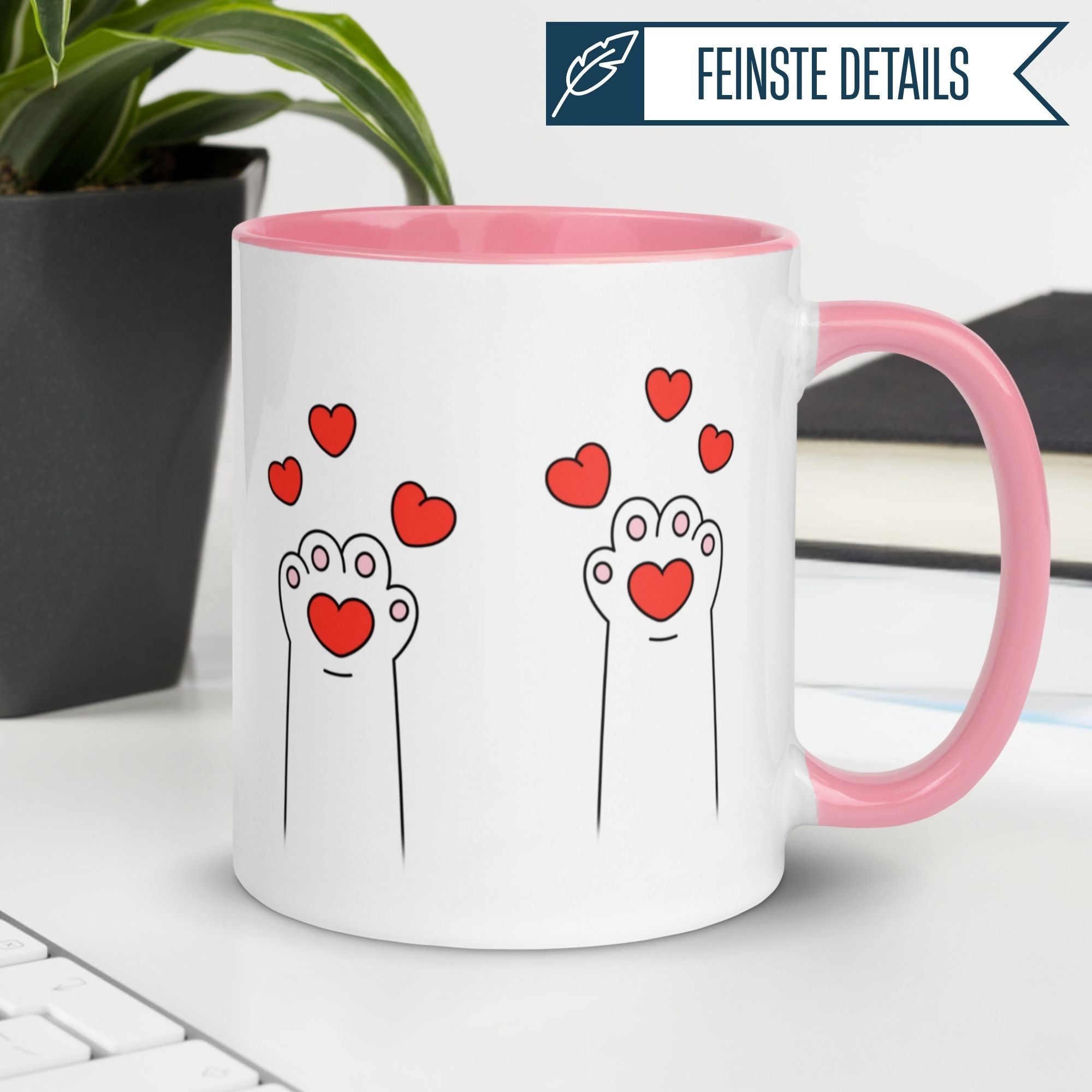 Momentals Tasse mit Katzenpfoten und Herzen, pinker Henkel, ideal für Katzenliebhaber.