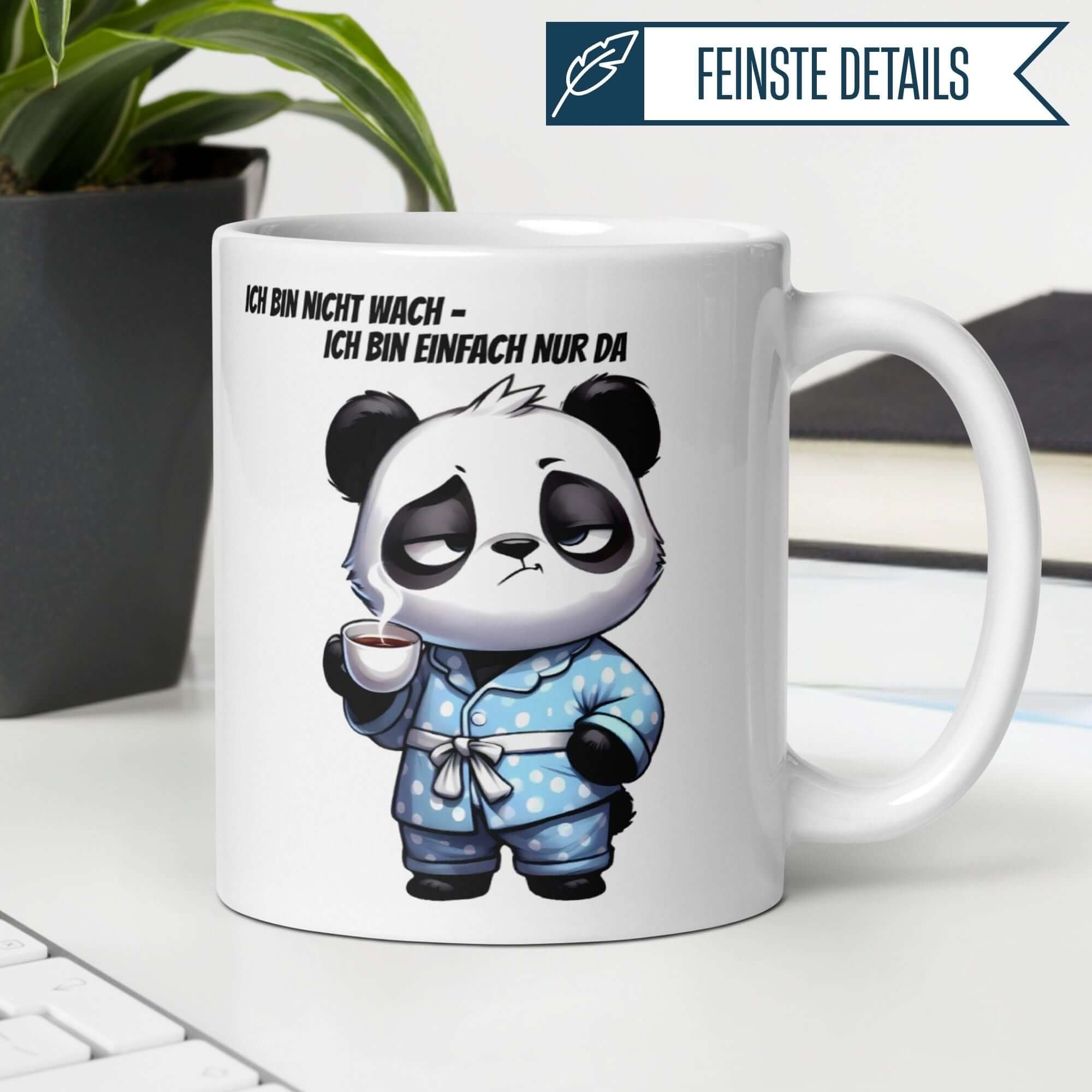 Momentals Panda Mug with text 'Ich bin nicht wach - ich bin einfach nur da', perfect for morning grumps.