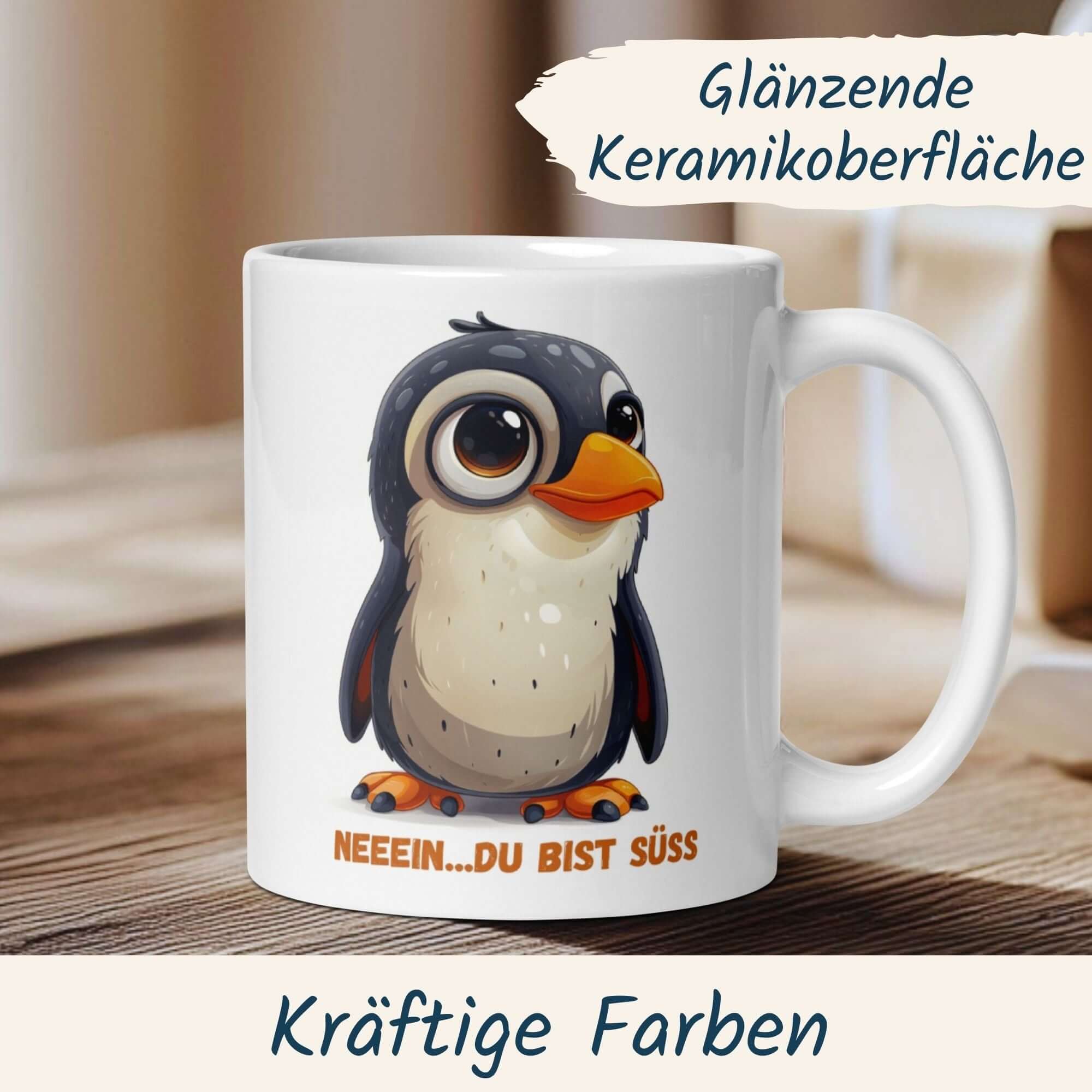 Momentals Tasse mit süßem Pinguin und Spruch 'Neeein... Du bist süß', perfekte Geschenkidee für Herzensmomente.