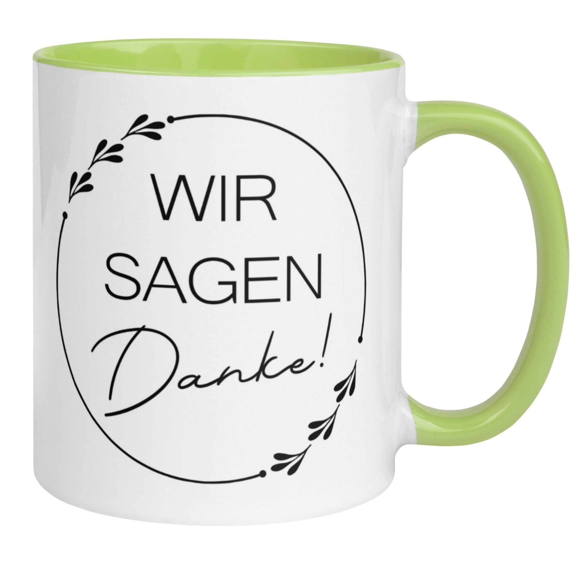 Momentals Tasse mit dem Spruch "Wir sagen Danke!" und zartem Blätterdesign in Weiß und grün.