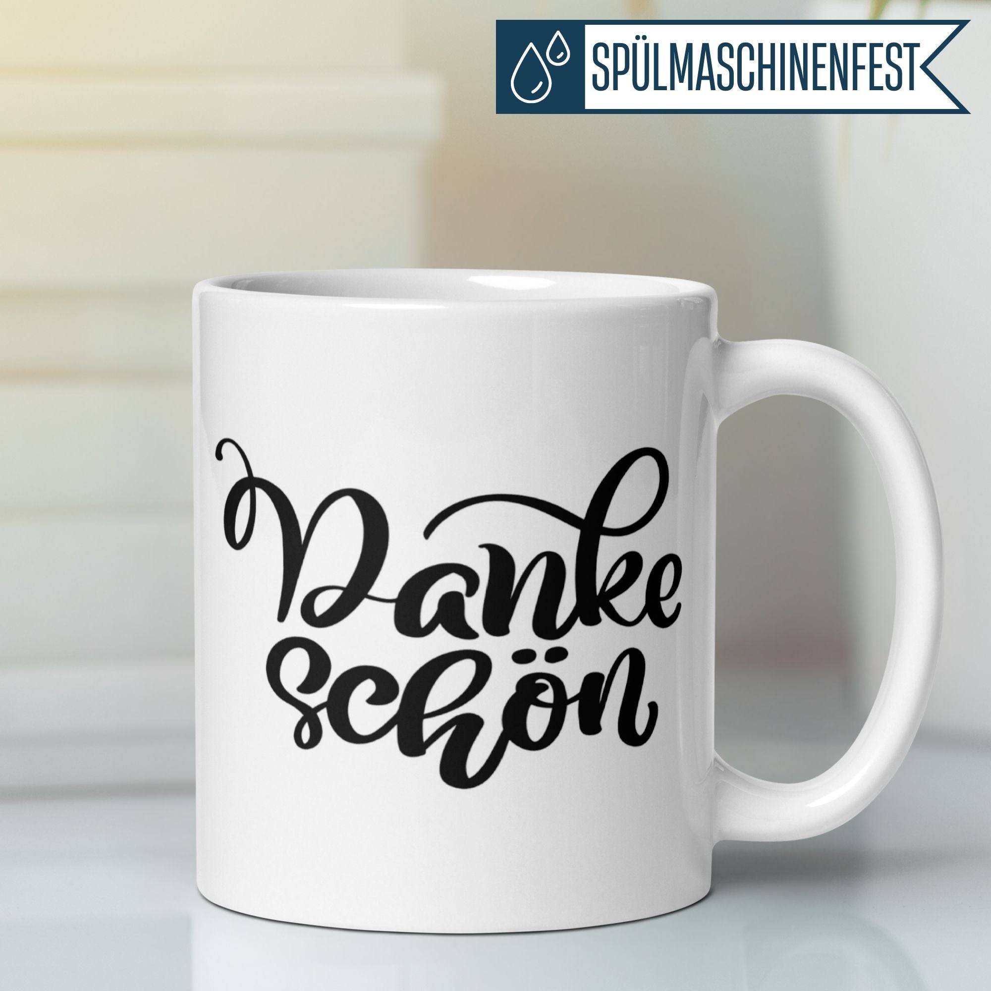 Elegante Tasse mit dem Schriftzug „Dankeschön“ im Handlettering-Stil, ideal als Geschenk.