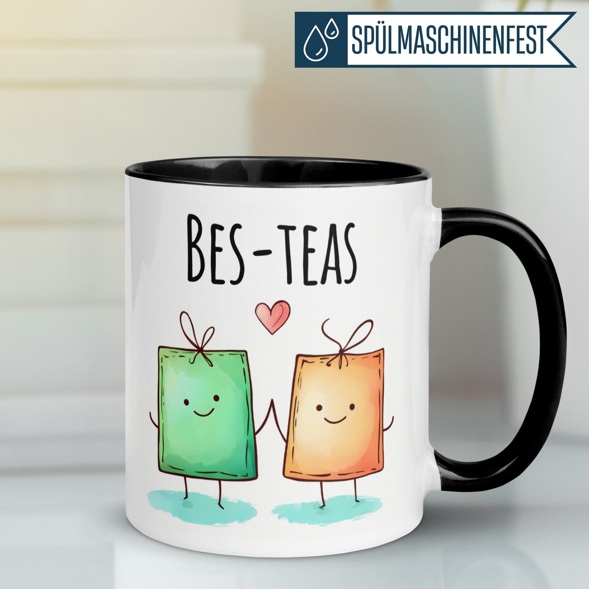 Momentals® Tasse mit niedlichen Teebeuteln, die Händchen halten und "Bes-teas" Liebe zeigt.