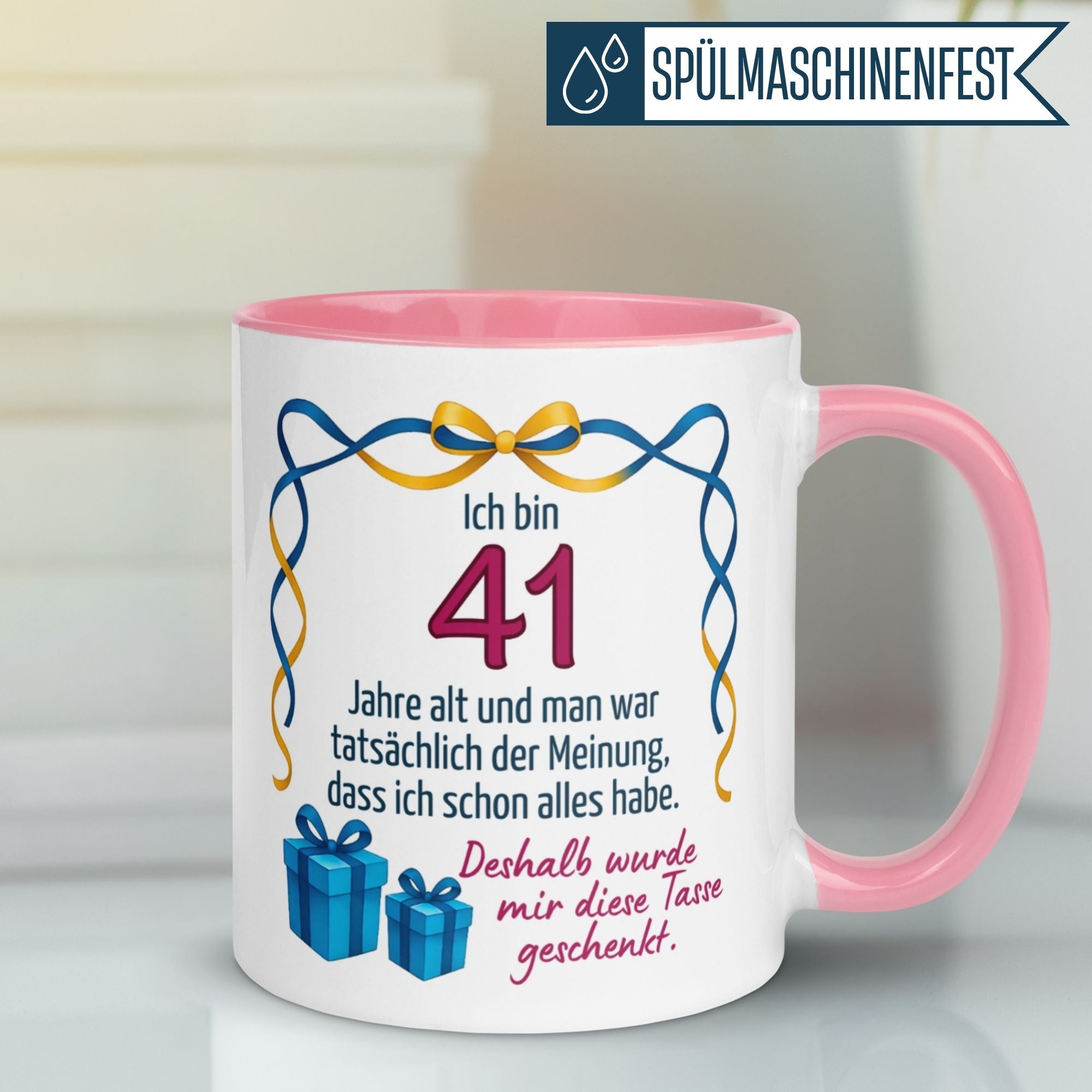 Pink coffee mug with funny 41st birthday quote and gift box design, perfect for celebrating a friend's special day.