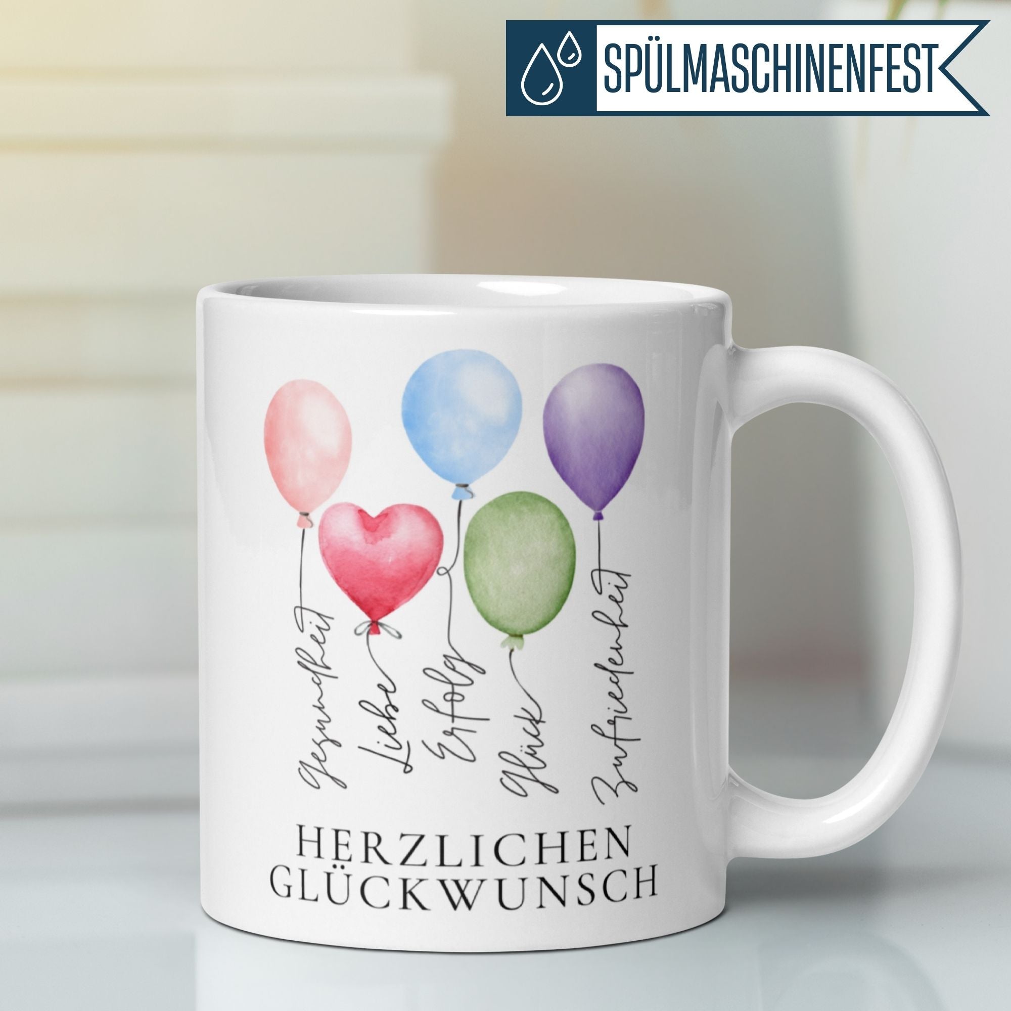 Momentals® Tasse mit herzlichen Glückwünschen und bunten Ballons im Aquarellstil.