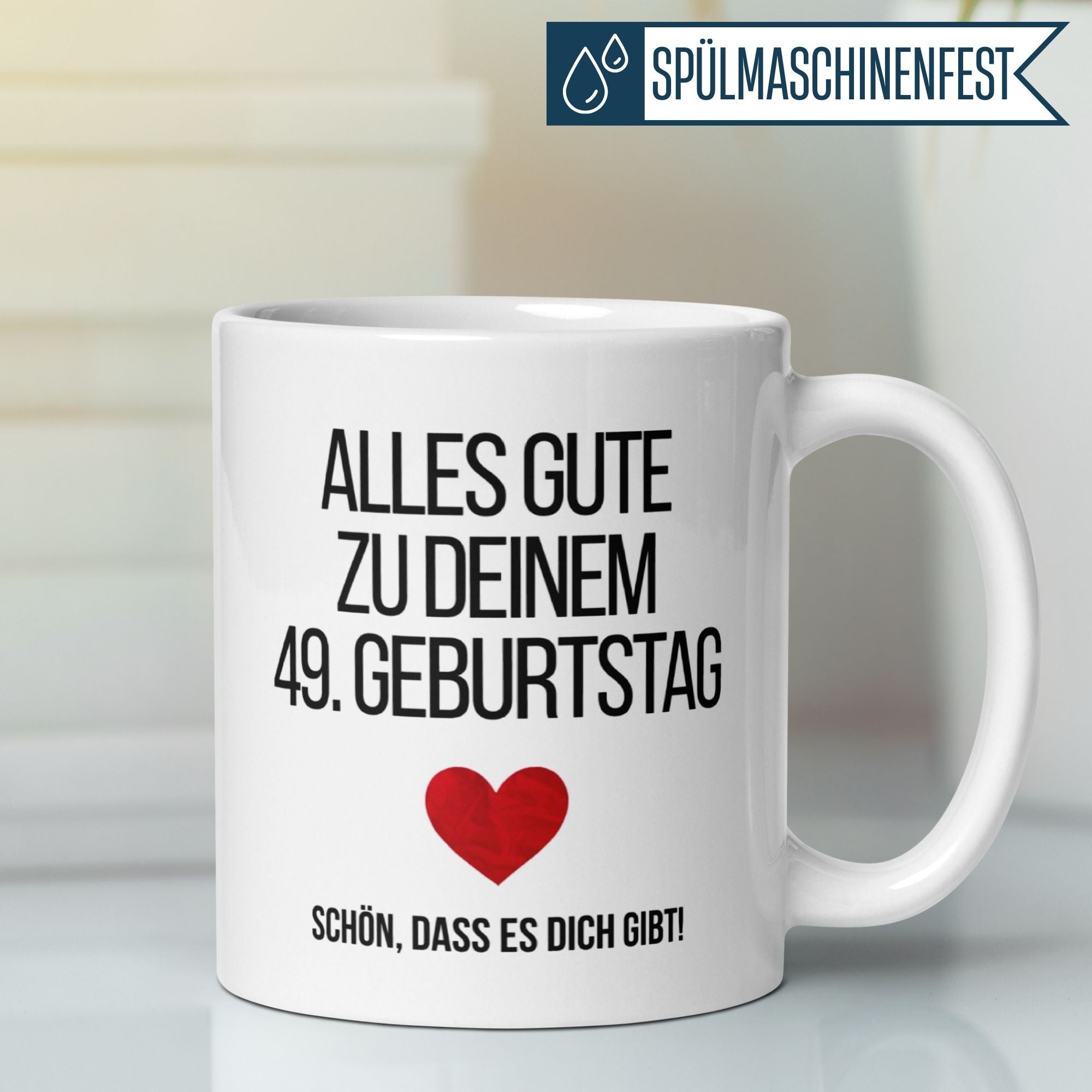 Weiße Tasse mit herzlichem Geburtstagsgruss zum 49. Geburtstag und Herzmotiv.