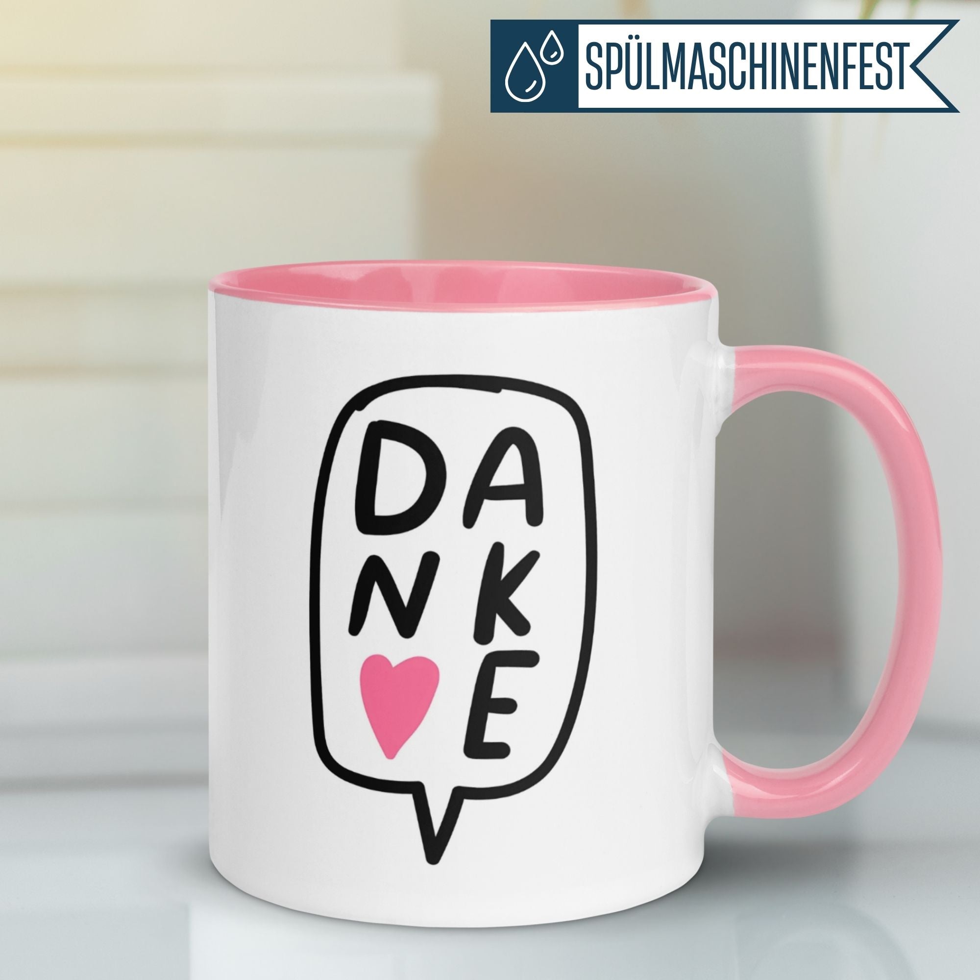 Momentals Tasse mit pinkem Griff und Comic-Sprechblase: "DANKE mit Herz" für Wertschätzung in jeder Kaffeepause.