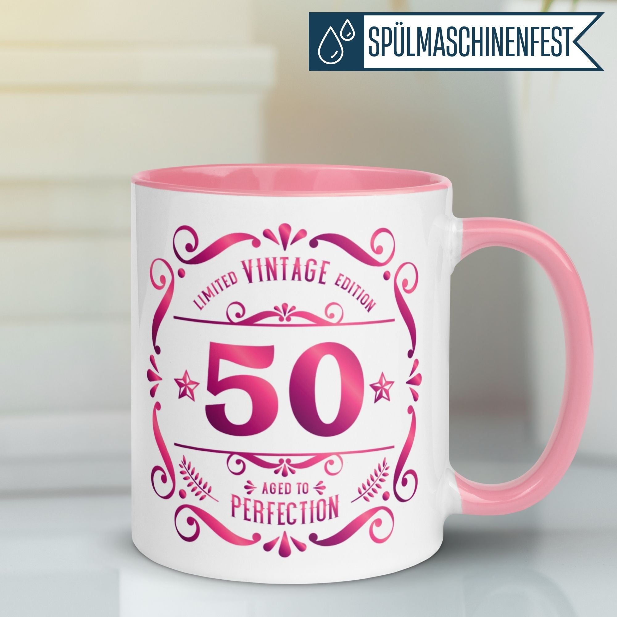 Momentals® vintage birthday mug for women, celebrating 50 years, with cheerful design 'Aged to Perfection'.