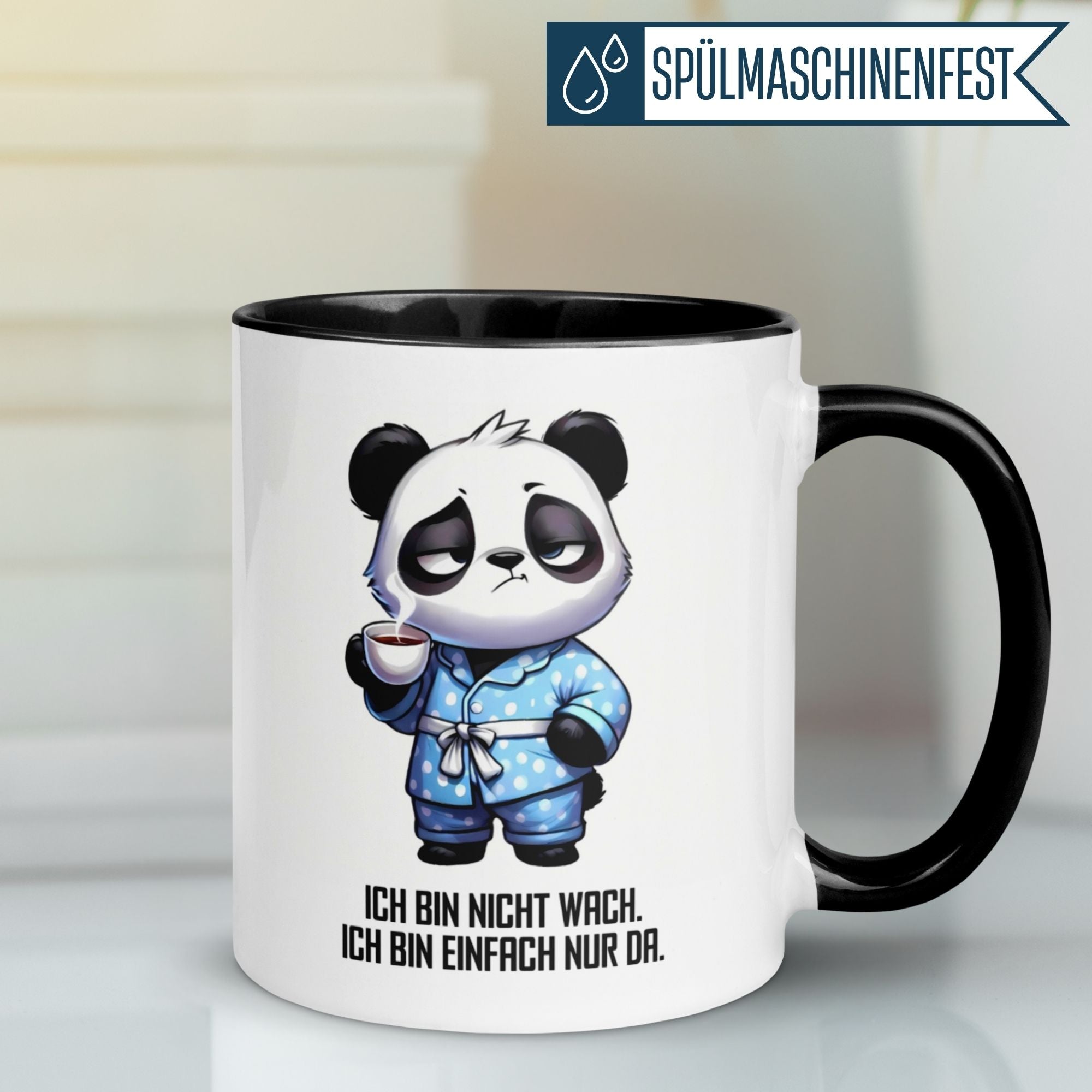 Momentals® panda mug with the quote 'Ich bin nicht wach - ich bin einfach nur da' in a humorous design.