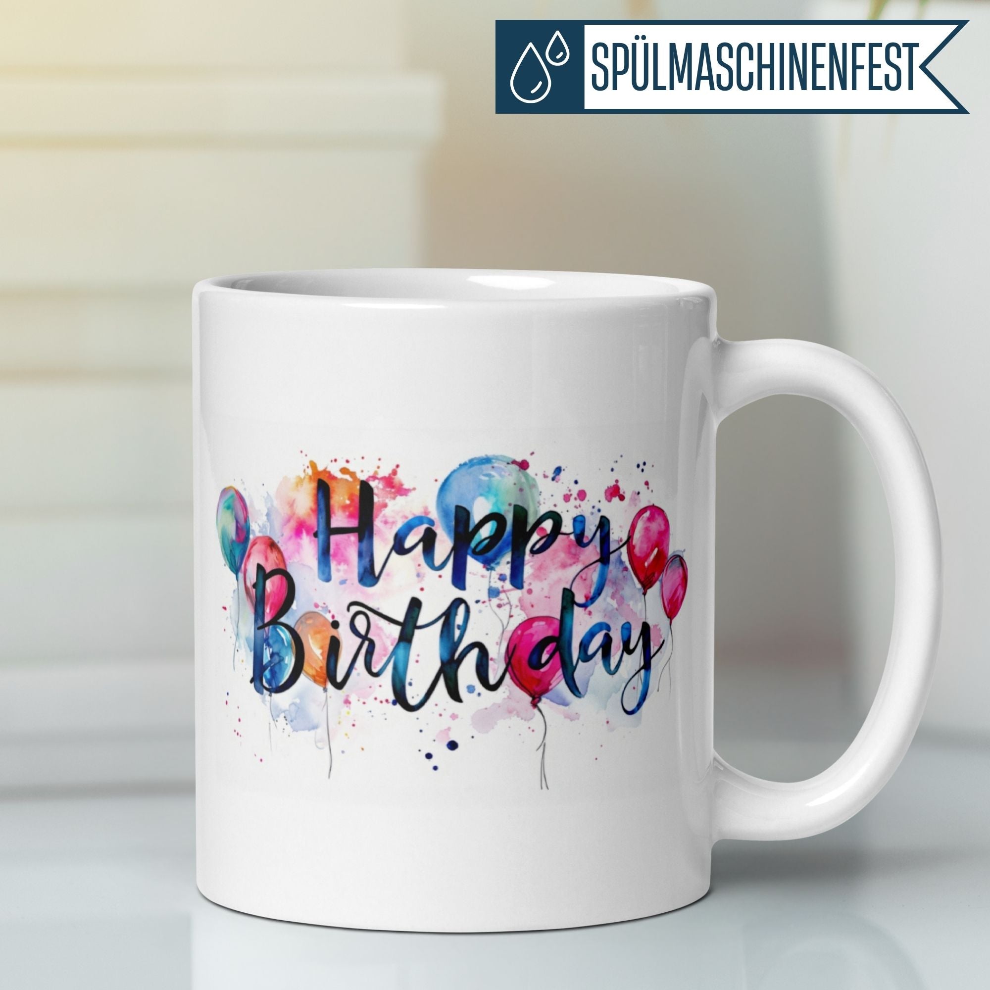 Bunte Tasse mit Aquarellballons und "Happy Birthday" Schriftzug für Geburtstagsfeiern.