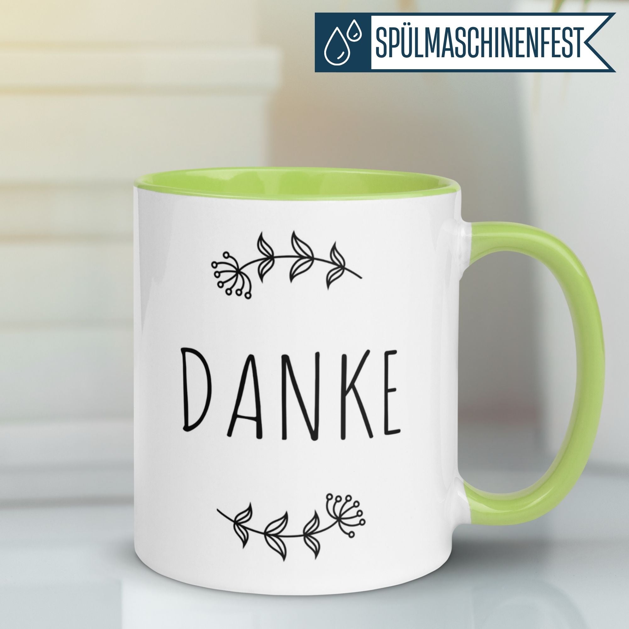 Momentals® Tasse mit "Danke"-Spruch und floralem Design in Grün, ideal für Kaffeepausen.
