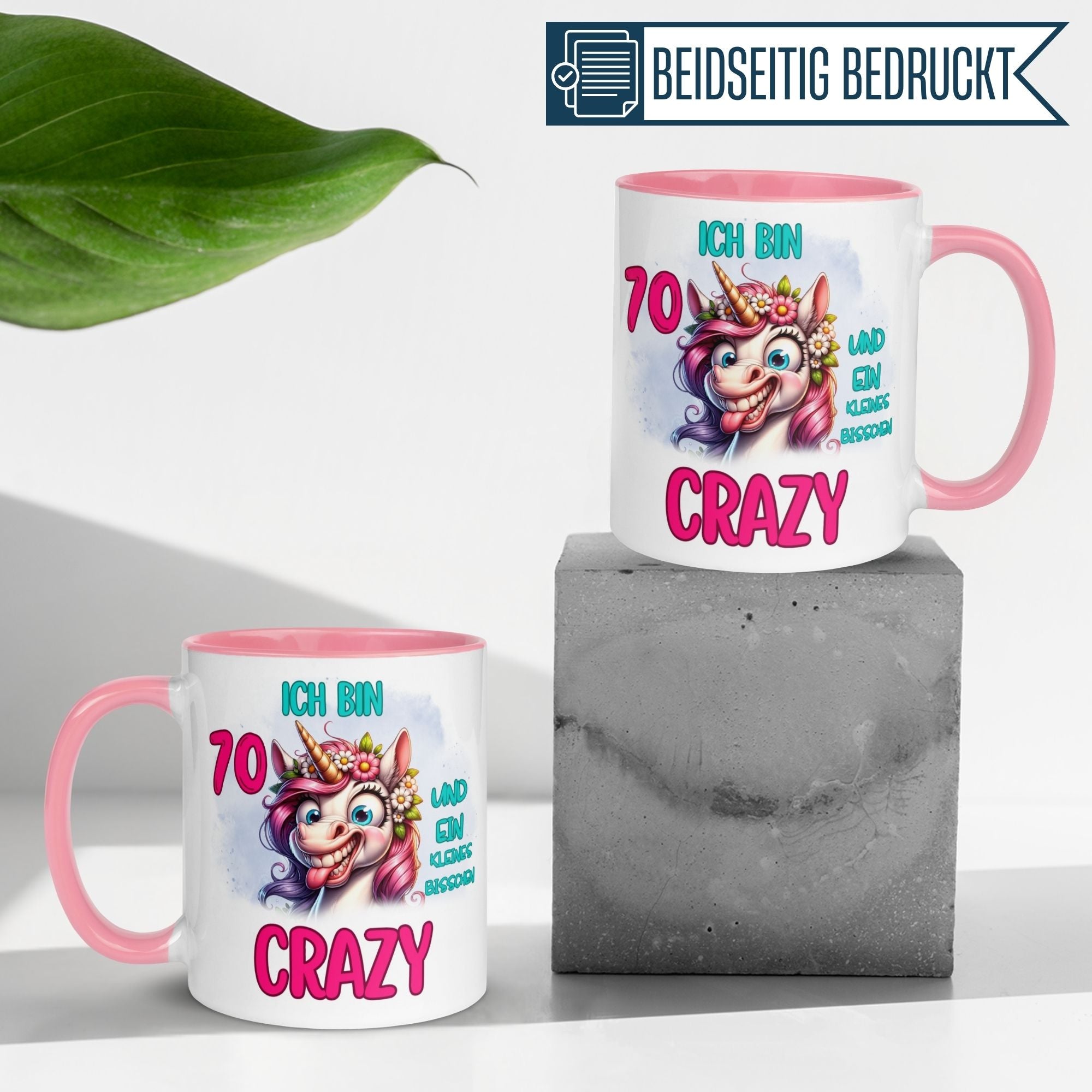 Momentals® Tasse zum 70. Geburtstag mit Einhorn und Spruch 'Ich bin 70 und ein kleines bisschen crazy'.