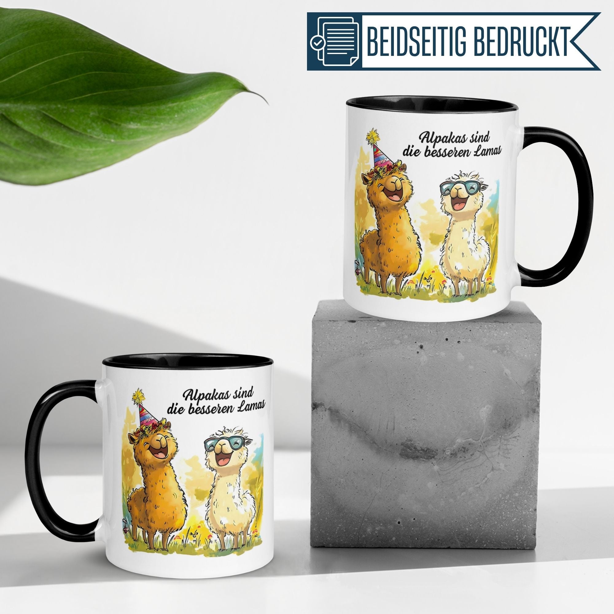 Momentals Tasse mit fröhlichen Alpakas, die sagen: "Alpakas sind die besseren Lamas!"