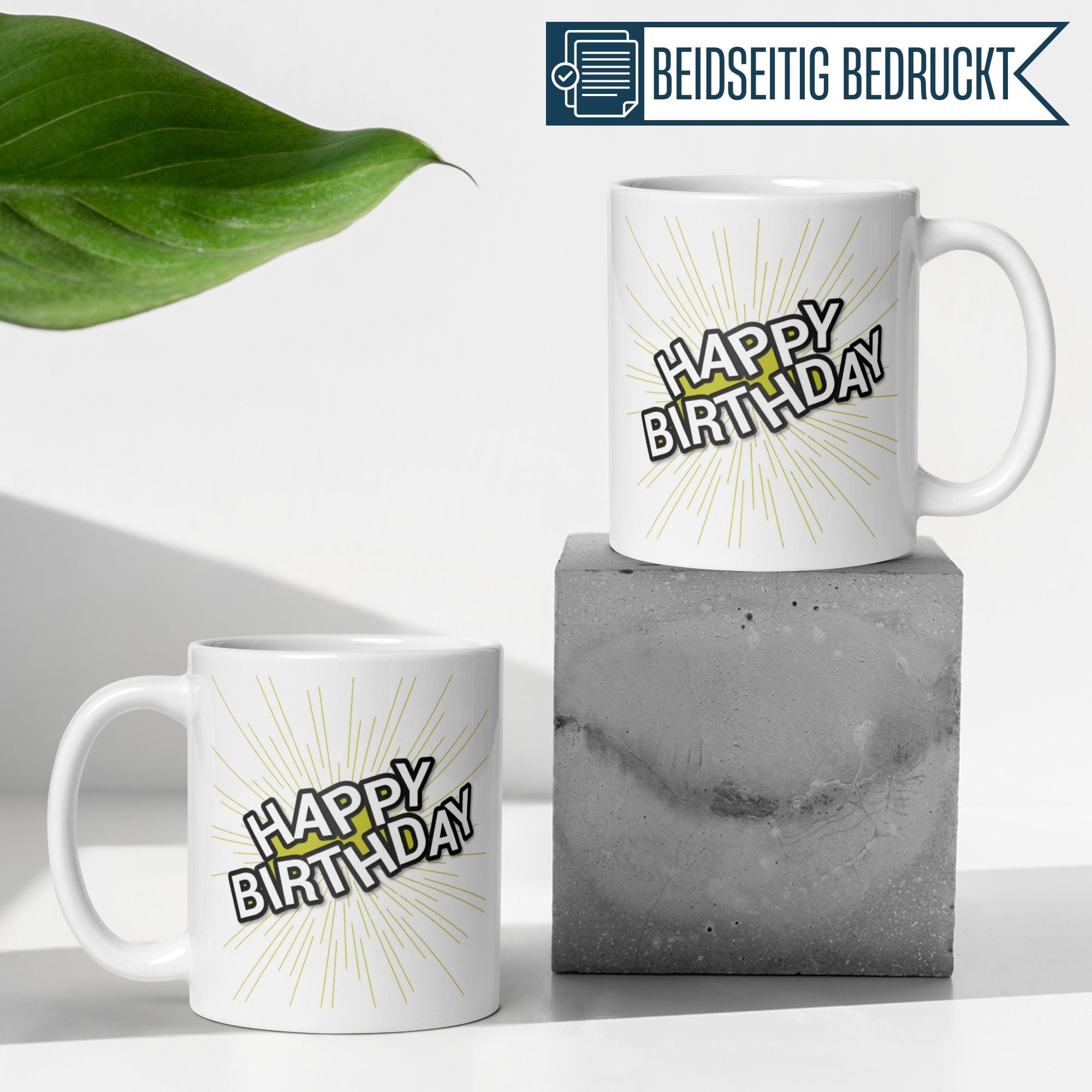 Momentals Tasse mit "Happy Birthday" Schriftzug und Strahlenkranz, perfekt für Geburtstagsfeier. Beidseitig bedruckt.