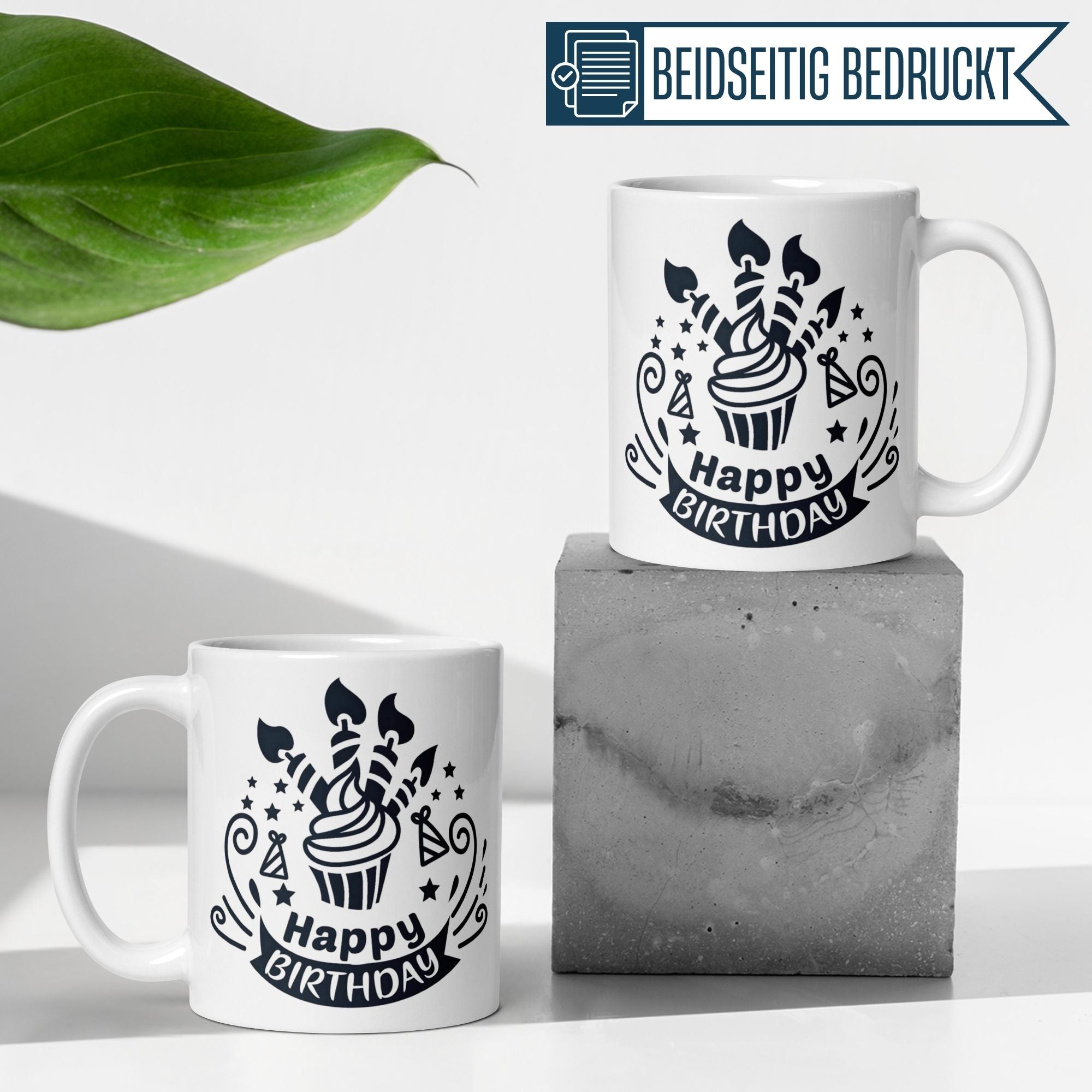 Stylish birthday mugs with black and white cupcake design, featuring 'Happy Birthday' text and festive symbols.