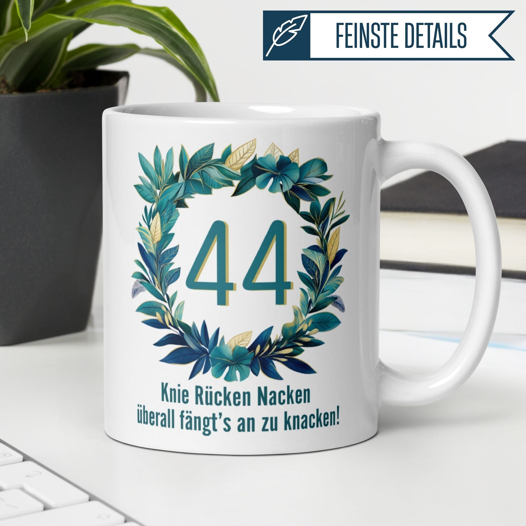 Colorful mug for 44th birthday with leafy mandala design and humorous text about aging.