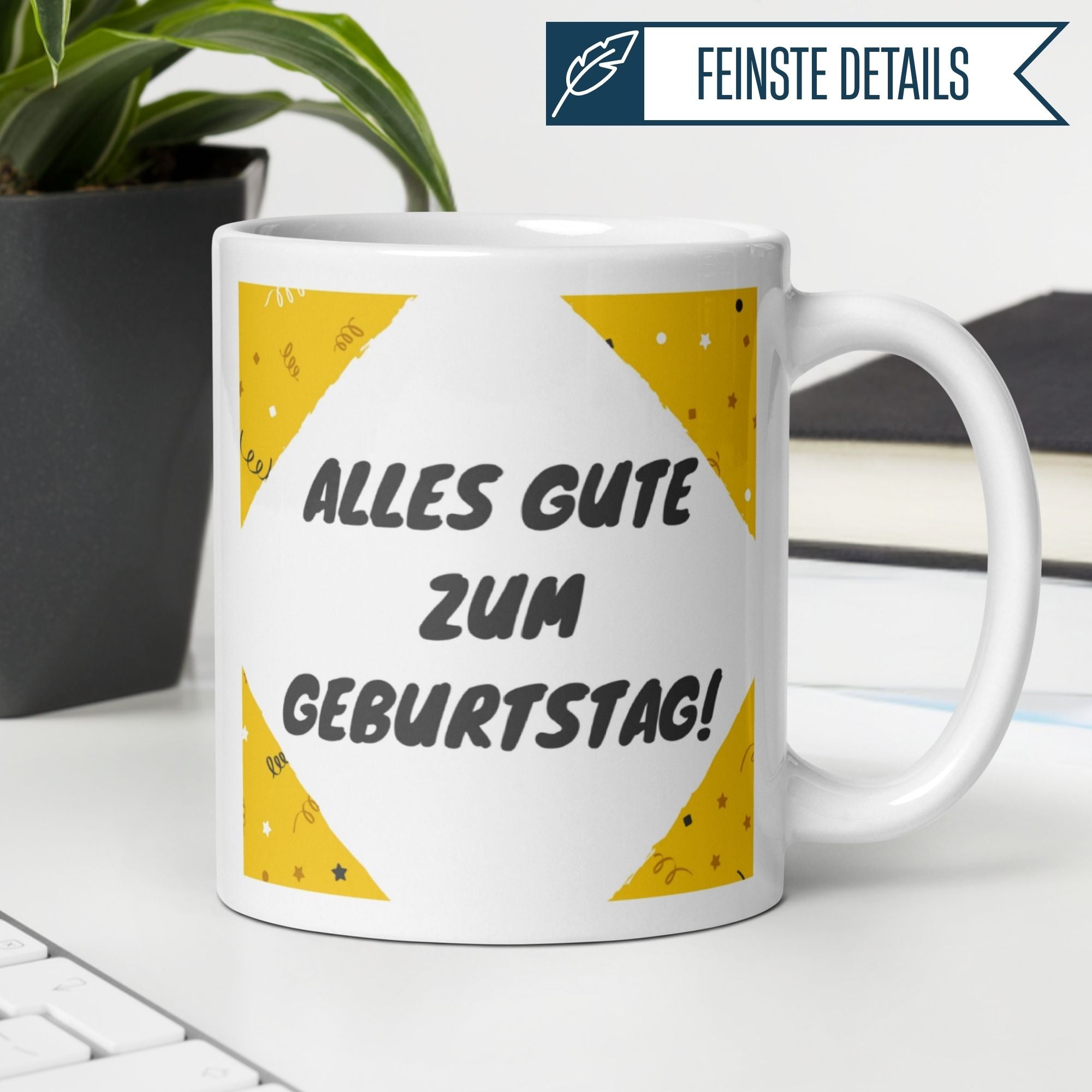 Weißer Kaffeebecher mit gelben Konfetti und fröhlichem Geburtstagsspruch "Alles Gute zum Geburtstag".