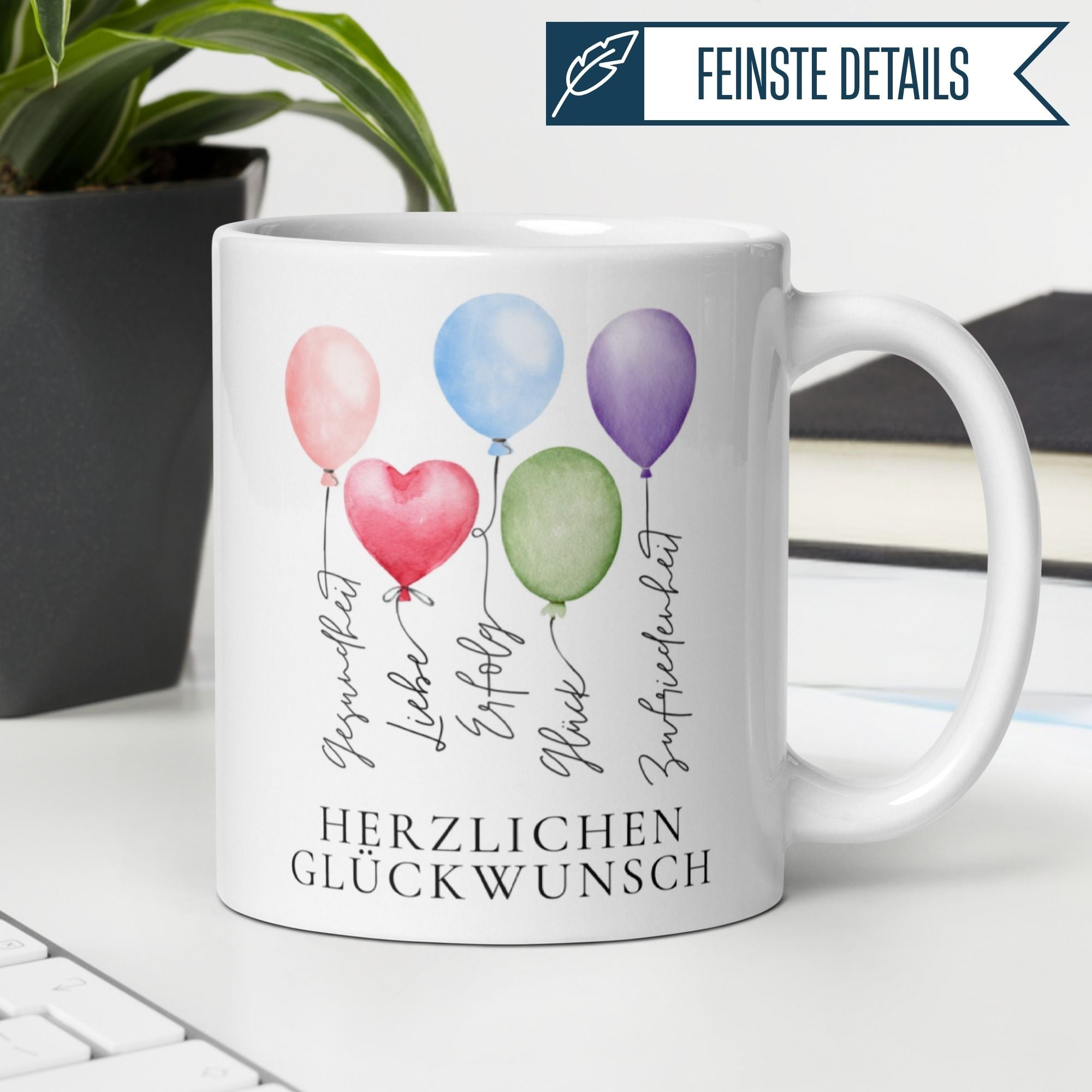 Momentals Tasse mit bunten Ballons und handgeschriebenen Wünschen: Gesundheit, Liebe, Glück. Herzlichen Glückwunsch!