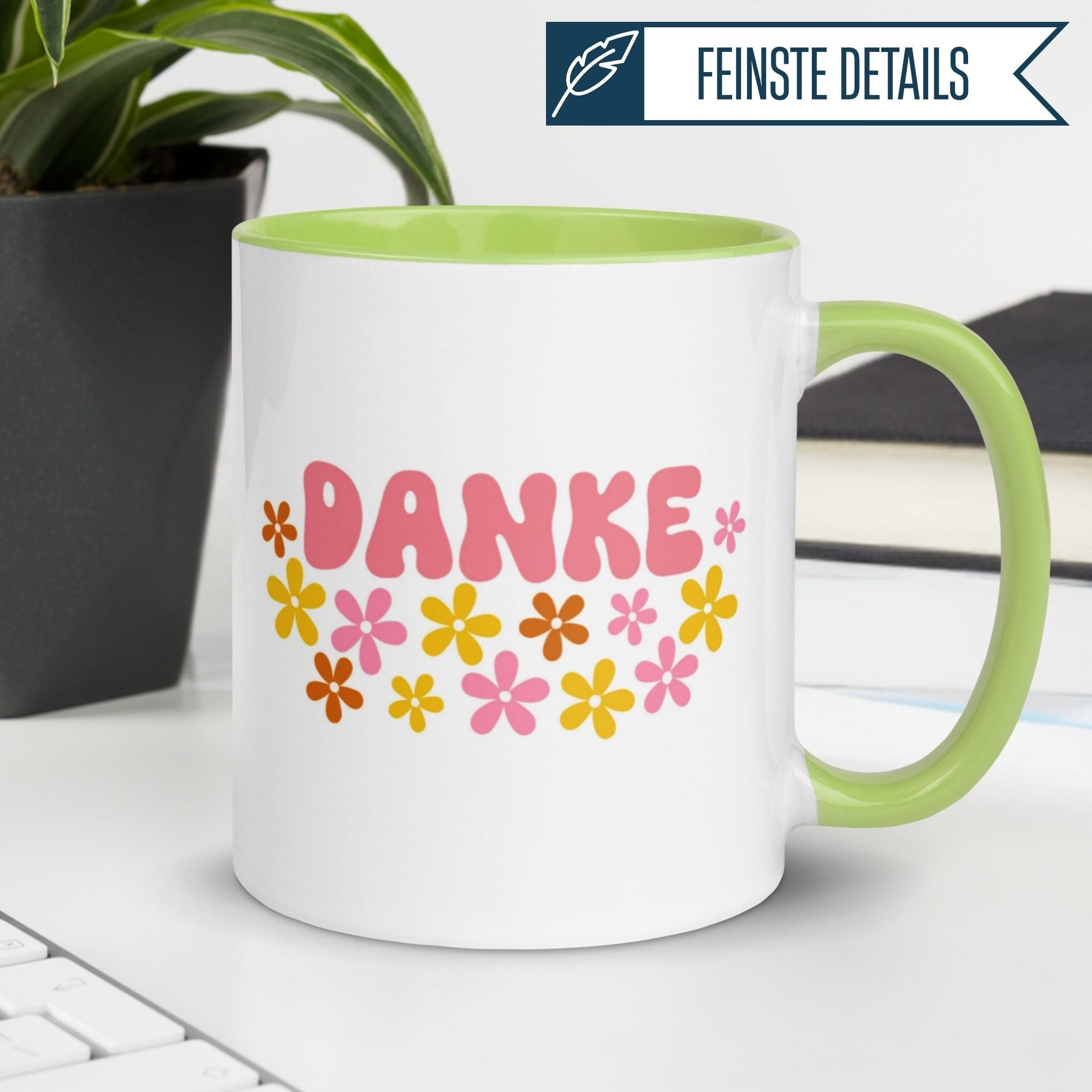 Momentals® Tasse mit 'DANKE' in bunten Blumen, ideal für Wertschätzung im Flower Power Stil.