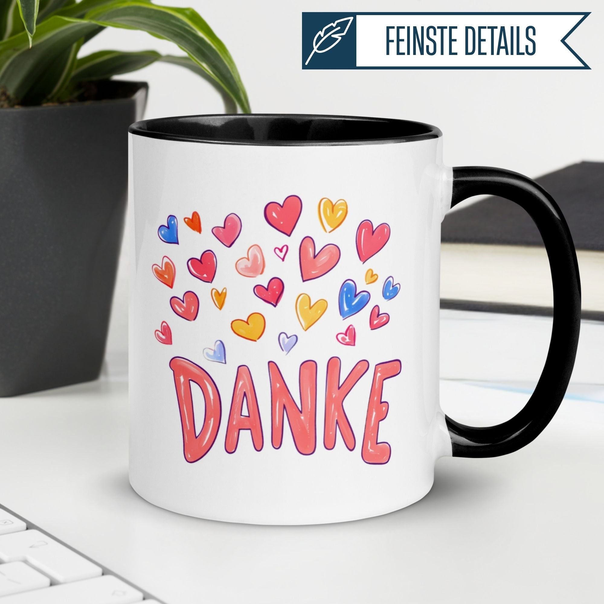Momentals® Tasse mit bunten Herzen und "DANKE" Schriftzug, perfekt für die Kaffeepause.
