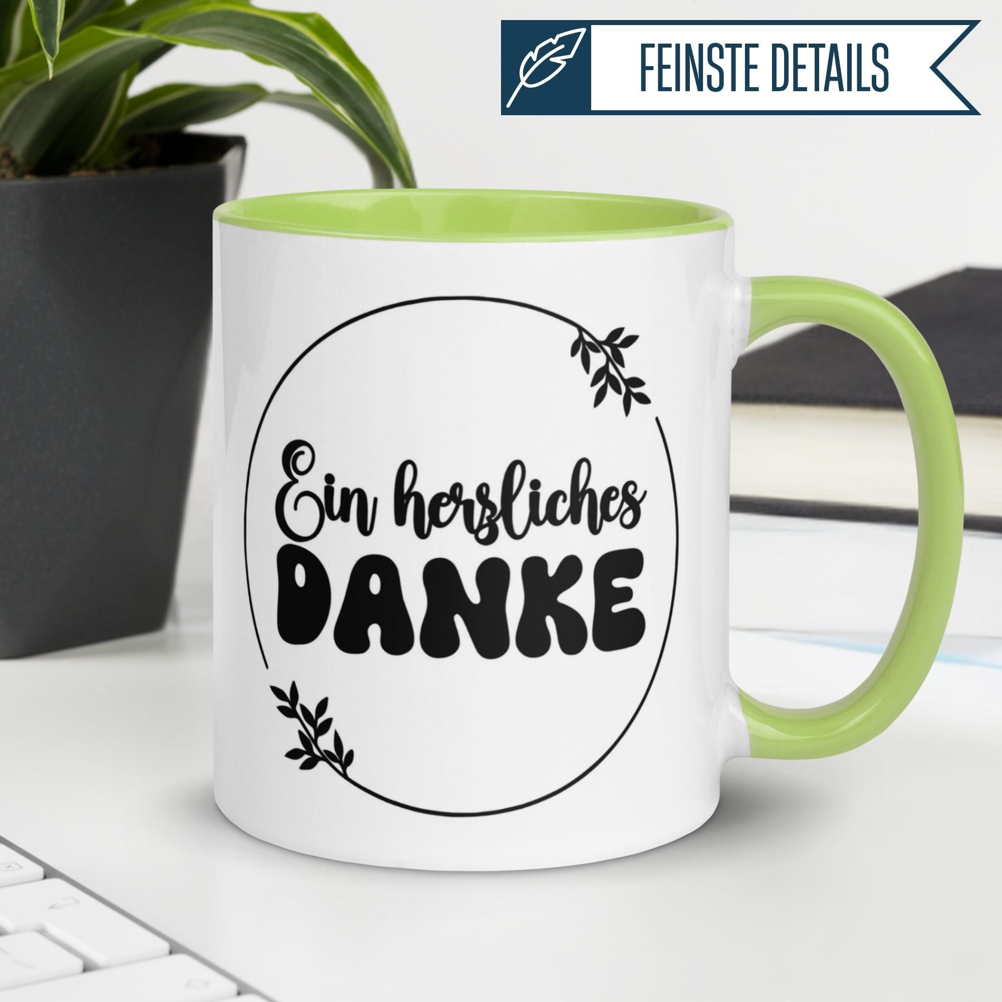 Momentals® Tasse mit dem Text "Ein herzliches DANKE" und Blätter-Motiv, ideal für Wertschätzung.