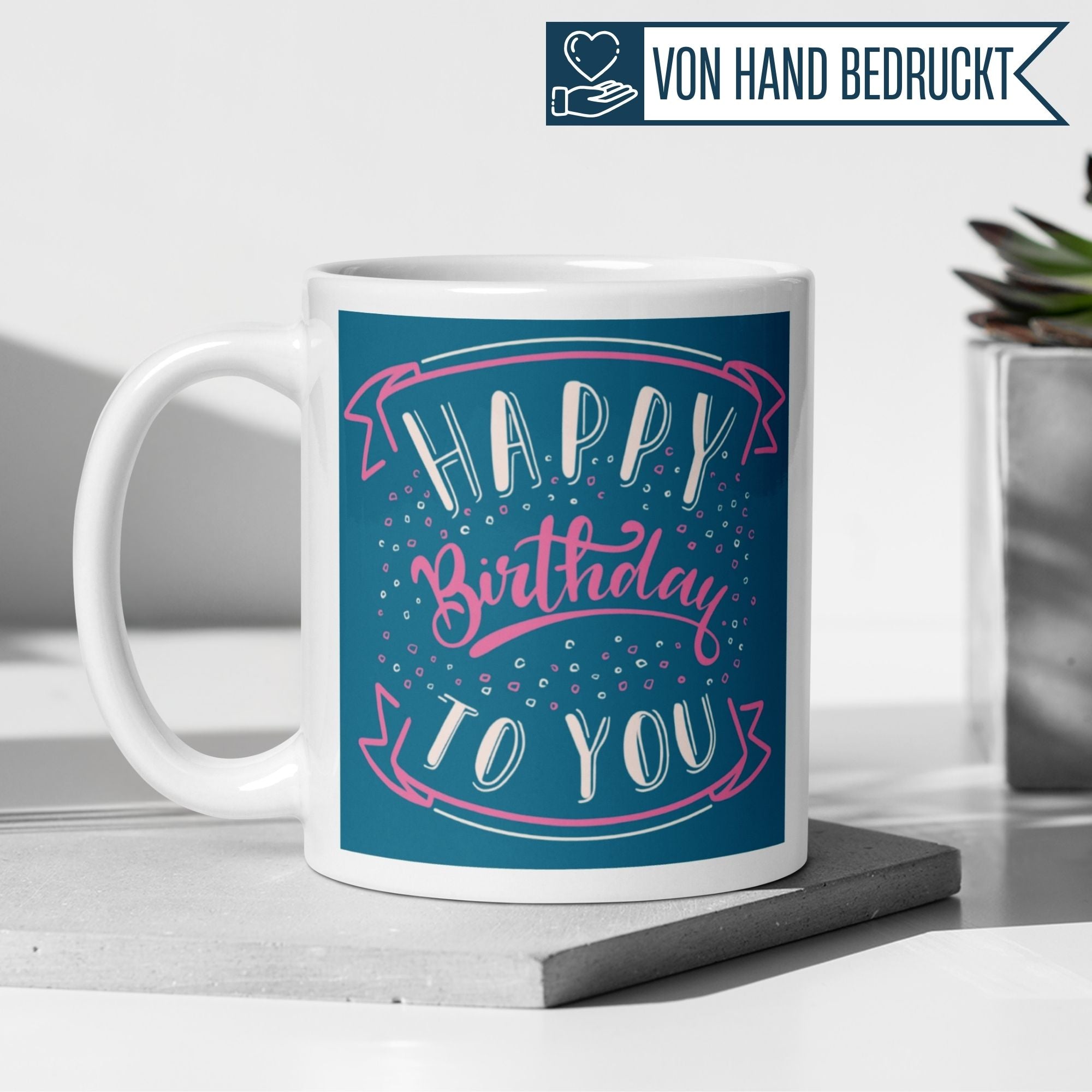 Momentals® birthday mug with 'Happy Birthday to You' design on dark blue background, playful and cheerful.