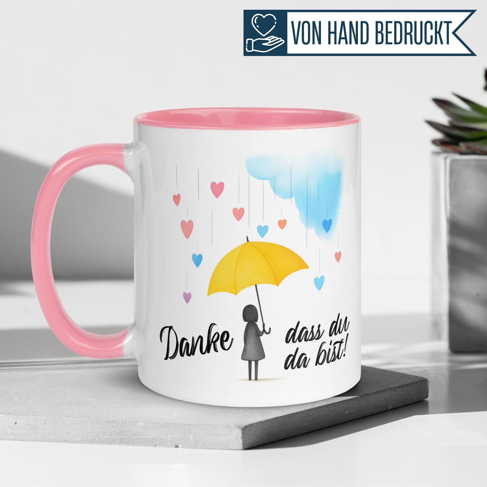 Momentals Tasse mit Regenschirm-Design, Text 'Danke dass du da bist', perfekte Geschenkidee für Wertschätzung.