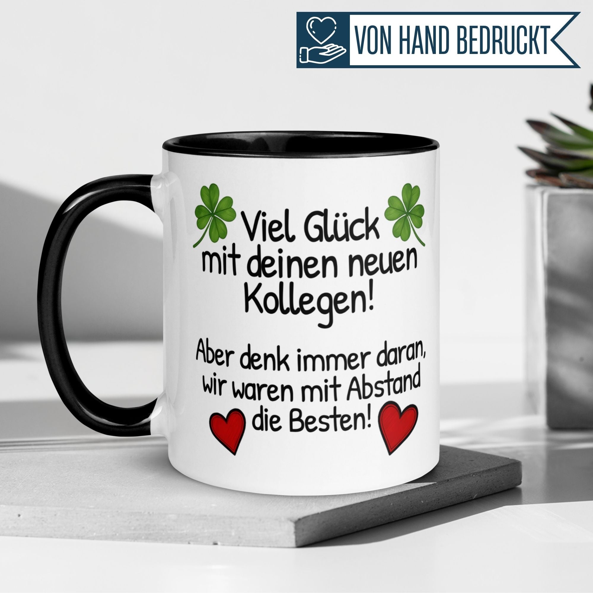 Momentals Tasse mit Glücksboten, Kleeblatt und Herzen, ideal zum Abschied von Kollegen.