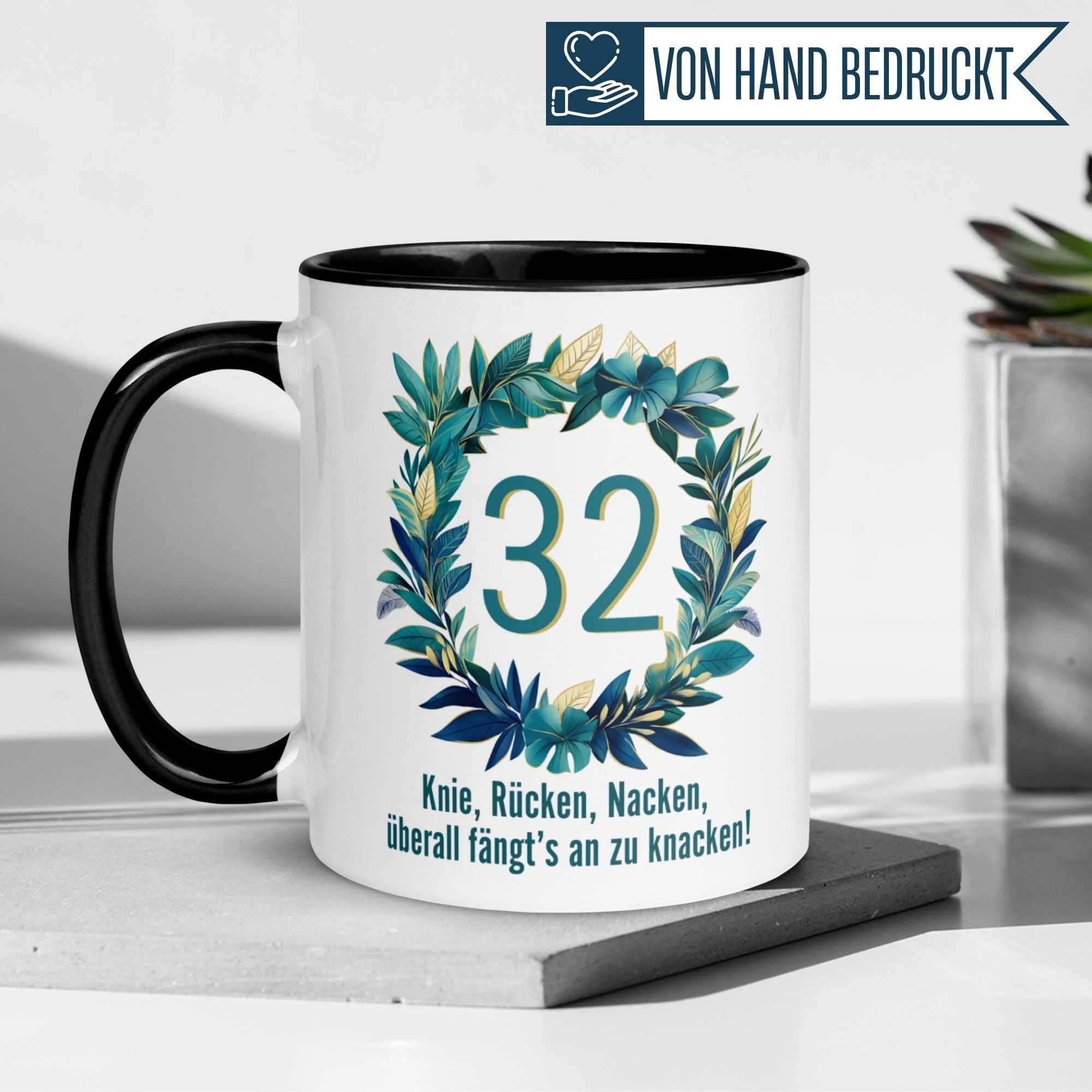 Humorous birthday mug for 32nd birthday with a leafy wreath and witty text about knees, back, and neck.